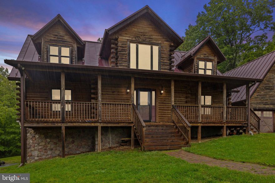 Incredibly charming log cabin home with long view of neighboring field, otherwise it is a mostly wooded 8+ acre lot. Enjoy the meditation of arriving home via a short and seldom traveled gravel drive  off coveted Ramey Road. Just 6 miles to the fine dining and conveniences of Marshall. This home will require some modest new owner investments catching up on some deferred maintenance and unfinished projects, but it is move in ready. Great opportunity to add value. Sellers are looking for an "as-is" sale. List price was set based on appraisal dated 1/30/24 . Sneaky large house offers many opportunities for decorating, organizing living spaces and hobby rooms. This is a must see for those who adore the look and feel of a log cabin.