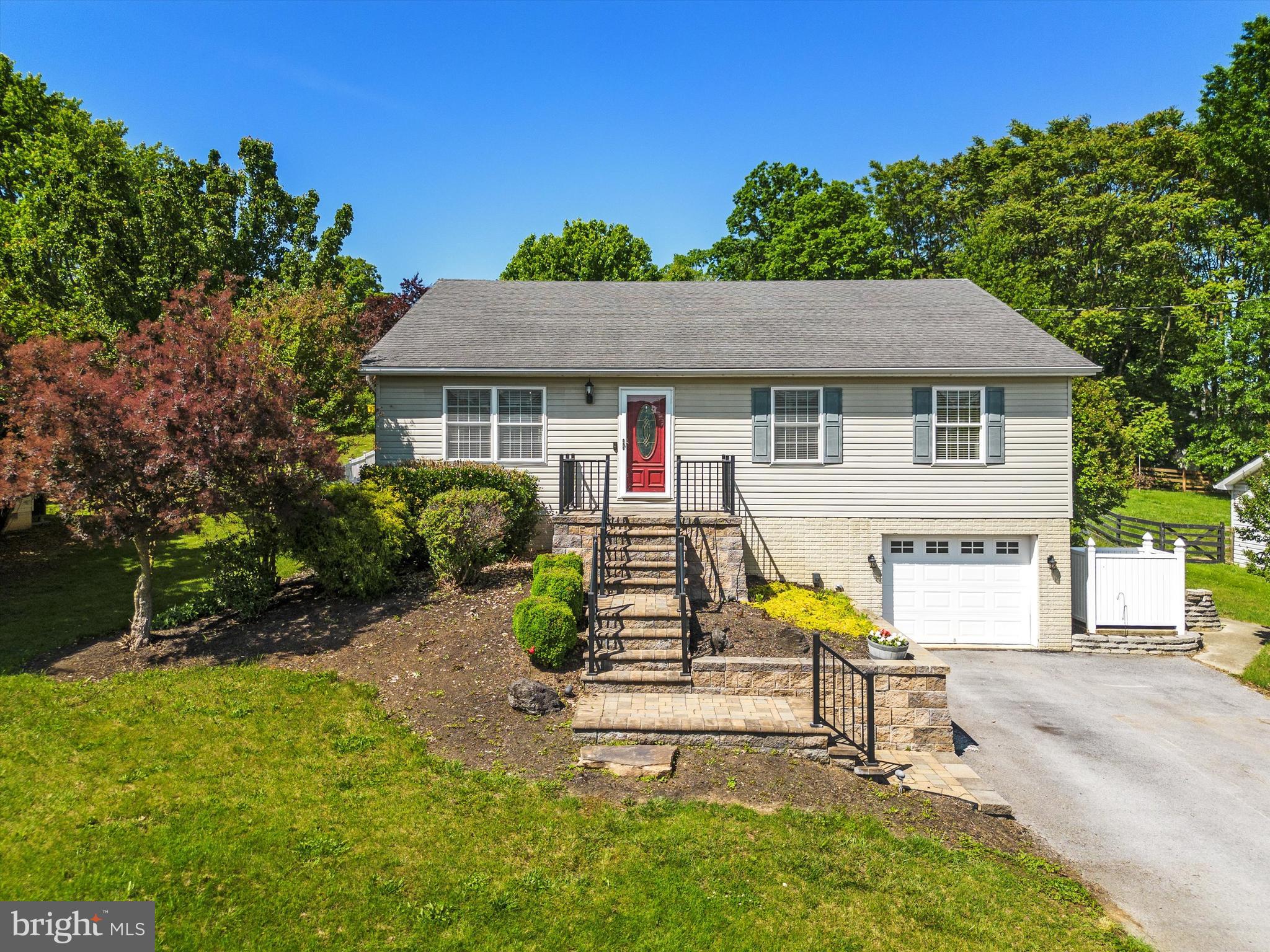 If a gorgeous open-concept kitchen, an abundance of storage, and a private backyard for enjoying the summer months are on your wish list, check out 61 Putnam Drive! Just minutes from I-81 sits this raised ranch in a quiet, established neighborhood featuring 3,600 square feet with 3 bedrooms and 3.5 baths. A spacious eat-in kitchen with large island, bar seating, and upgraded finishes is the heart of the home and adjoins the family room with gas fireplace for convenient and comfortable living. The main floor primary bedroom has an attached en-suite bath with a garden tub and large walk-in closet. The finished lower level includes various spaces to meet all of your needs – an oversized bonus room, full bath, office/workout space, workshop, attached garage, and alternate laundry room. Outside, the fully fenced backyard features mature landscaping, deck, and a paver patio complete with a built-in fire pit. Get to local amenities and commuter routes easily from this fantastic location. Come see this unique property for yourself!