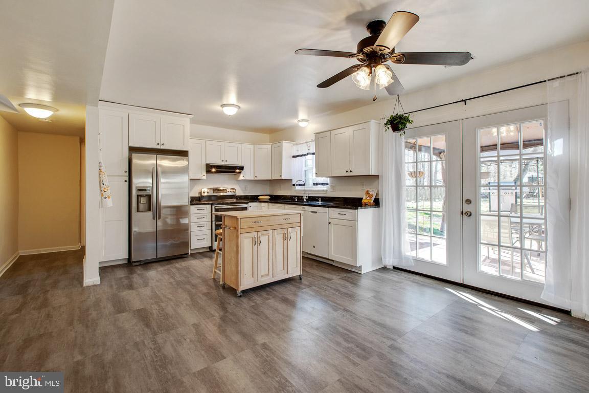 Fantastic opportunity! This freshly updated split-level home features new carpet and paint and an open floor plan spread over three levels of living space and is ready for you to move right in! The upper level include soaring ceilings and ample natural light, which lend an airy feeling to the home while maintaining a connection to the outdoors. Two bedrooms and one bath on the upper floor and one bedroom on the middle floor are connected to the rest of the home by a bright, open family room. Step outside the lower-level kitchen into a level backyard with a patio, grilling area and fire pit, perfect for three-season entertaining. A sunroom extends the outdoor living space while offering protection from the elements. The well appointed eat-in kitchen features newer appliances (stove has double oven!), granite countertops, kitchen island, pantry, updated flooring and plenty of eat in space /room for hanging out. This home's location on the edge of the development make coming and going a breeze. Easy access to Route 4 makes commuting to points north and south simple. Gas grill, pantry cabinet, kitchen island/barstools, patio furniture, cabanas, lawn mower and equipment all convey with the house!!! Home warranty included. Make your appointment today!