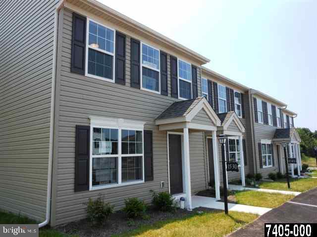 USDA 100% Financing Enjoy the convenience of Rural setting but close to everything. Only 2.5 miles from I-83 Exit. 3 Bedroom Townhome Open Floor Plan patio off Dining Room. Kitchen with Range, Dishwasher and Microwave included in the sale.