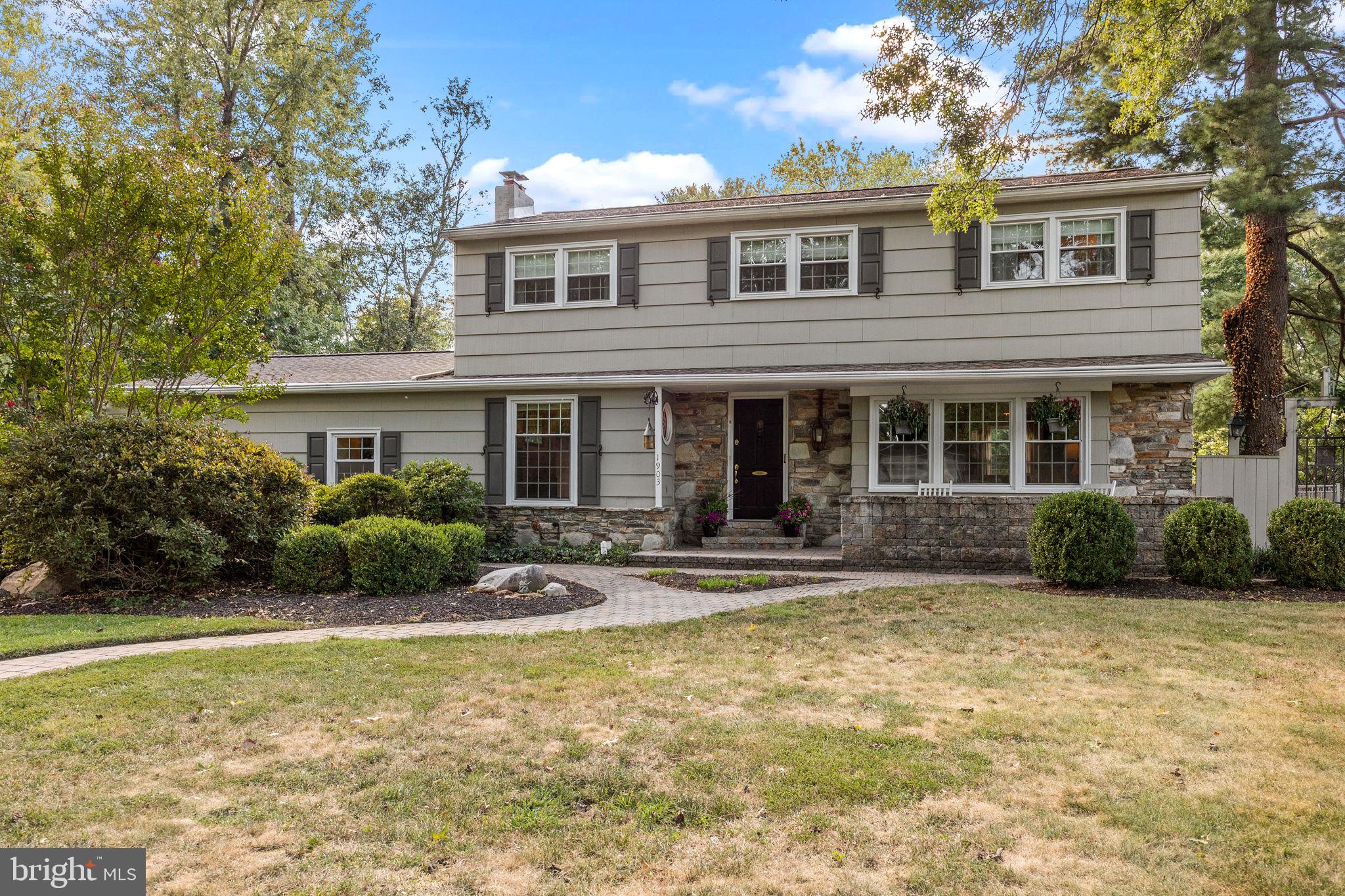 Welcome to 1903 Woodland Drive—a beautifully maintained colonial set on a picturesque half-acre corner lot in the award-winning Pennsbury School District. This home perfectly blends timeless character with modern updates, offering both functionality and charm for today’s lifestyle.
As you arrive, the elegant paver walkway and mature landscape create a warm, inviting first impression. Step inside the foyer to find hardwood floors that flow seamlessly throughout the main level, complemented by abundant natural light streaming through large windows.
The spacious living room serves as the heart of the home, anchored by a cozy wood-burning fireplace—perfect for relaxing or gathering with family and friends. Just beyond, the open-concept layout leads into the showpiece kitchen, thoughtfully designed for both everyday living and entertaining. Highlights include stainless steel appliances, a double sink, ample cabinetry, and a striking center island topped with a one-of-a-kind granite slab. The adjoining sitting area, framed by windows overlooking the backyard, offers the perfect setting for casual dining, morning coffee, or simply soaking in the view.
Upstairs, the serene primary suite provides a true retreat, complete with generous closet space and a refreshed full bathroom. Three additional well-sized bedrooms, with ample closet storage—share a second full bath, ensuring plenty of comfort for family and guests alike.
The lower level expands your living space with a partially finished basement, offering versatility for a playroom, home gym, media room, or office, while still leaving ample storage space.
Outdoors, the property transforms into your own private oasis. Entertain with ease on the expansive two-tier deck, take a dip in the sparkling in-ground pool, or unwind in the hot tub while enjoying wooded views that provide both beauty and privacy. Whether hosting summer gatherings or enjoying quiet evenings under the stars, this backyard is built for year-round enjoyment.
Additional highlights include a two-car garage with extra parking and storage. This move-in ready home is a rare opportunity in a quiet, highly desirable neighborhood. Conveniently located near top-rated schools, shopping, dining, and major highways, it also offers easy access to Yardley, Newtown, and nearby New Jersey. Schedule your private tour today!
