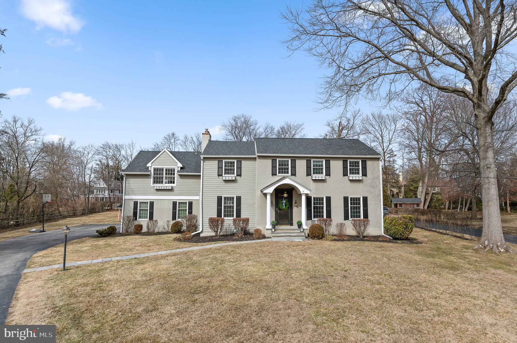 Welcome to 407 Meadowbrook Avenue, a spectacular home nestled in the heart of South Wayne. Perfectly situated on a large flat lot along a coveted quiet street, this residence offers the rare combination of a walk-to-Wayne lifestyle with expansive front and back yards—a true gem in Radnor Township. Inside, gleaming hardwood floors set the tone for the inviting and versatile floor plan, where every space can be tailored to fit your lifestyle. The foyer opens to a flexible layout, allowing rooms to serve different purposes based on your needs. Currently, the front room functions as a large office, but it could easily transition into a formal living room that flows into the dining room, where a fireplace creates a warm and inviting ambiance. The heart of the home is the family room, also featuring a fireplace, which seamlessly connects to the gourmet kitchen. Thoughtfully designed with a breakfast area, large island, custom cabinetry, and soapstone countertops, this space captures stunning views of the backyard oasis. From the kitchen, step outside to a beautiful flagstone patio, perfect for outdoor entertaining and enjoying the privacy of the backyard. A mudroom with direct access to the attached garage provides convenience and functionality for daily living.
Just off the kitchen, a back staircase leads to an incredible second story bonus room. Featuring built-in cabinetry and massive Palladian windows, this sun-drenched space offers breathtaking views of both the front and back yards, making it ideal as a playroom, home office, or gathering space.
Upstairs, the exquisite primary suite is a true retreat, complete with an ensuite bath, a massive walk-in closet, and a conveniently located laundry closet. Three additional bedrooms and a well-appointed hall bath complete the second floor, offering comfort for family and guests alike.
The home’s finished lower level provides additional versatile living space, perfect for a media room, home gym, or recreation area. Additionally, a separate storage area ensures ample room for seasonal items and organization.
Step outside and enjoy the level backyard, a private haven perfect for entertaining, play, or simply unwinding in a peaceful setting.
With its unbeatable location, spacious design, and walkable proximity to Wayne, 407 Meadowbrook Avenue offers the best of Main Line living—where charm meets convenience in one of the area’s most sought-after neighborhoods.
SHOWINGS BEGIN THURSDAY MARCH 6th at 11AM, pictures will be up on Wednesday March 5th.