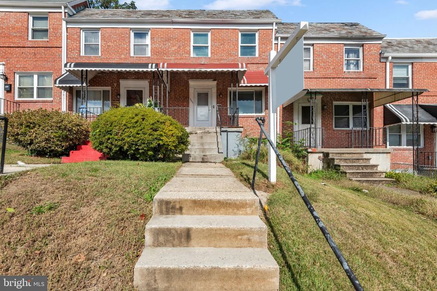 Great opportunity for first-time buyers or investors!  This 3-bedroom, 1-bath all-brick Edmondson Village Townhouse features hardwood floors and a full basement ideal for renovation or added living space.  Conveniently located near parks, shopping, and commuter routes.  Affordable and full of potential!