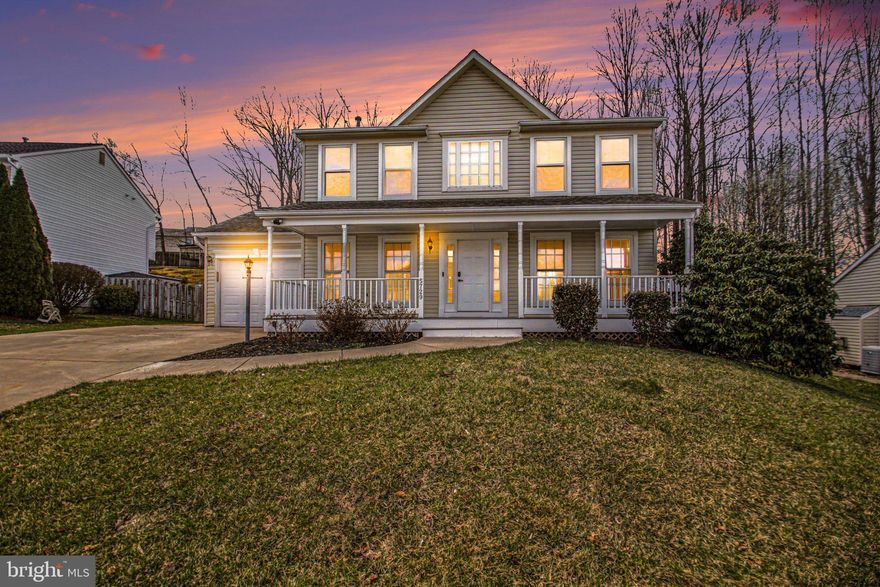 Welcome home to this charming colonial retreat where comfort, character, and everyday living come together beautifully—with no HOA and a fully fenced backyard for your own private escape. From the moment you arrive, the expansive front porch invites you to slow down, sip your morning coffee, and stay awhile.

Inside, you’re greeted by a light-filled, welcoming layout accented by luxury vinyl plank flooring throughout the main and upper levels—completely carpet-free for a clean, modern feel. The main level offers both formal and casual living spaces, including a spacious family room anchored by a gas fireplace, creating the perfect place to gather and entertain.

The heart of the home is the open, inviting kitchen, thoughtfully designed with granite countertops, stainless steel appliances, pantry storage, and a seamless flow into the breakfast nook. Just beyond, sliding glass doors lead to a concrete patio and fully fenced backyard—ideal for weekend barbecues, pets, or simply unwinding at the end of the day.

Upstairs, you’ll find a peaceful primary en suite featuring a walk-in closet, additional closet, ceiling fan, and private bath with dual sinks and a tub/shower combo. Two additional bedrooms and a full hall bath offer comfortable space for family or guests.

The lower level adds even more flexibility, featuring a spacious recreation room, full bath, and a versatile NTC bedroom—perfect for a home office, guest space, or den. The extra-wide walk-up exterior stairs provides direct access to the backyard, making the space both functional and connected.

Complete with a one-car garage and move-in ready condition, this home offers the perfect balance of style, function, and everyday comfort.

Tucked in a convenient Woodbridge location near shopping, dining, and commuter routes, this home is ready to welcome its next chapter. No HOA fees - Prime location near Dale Boulevard, Prince William Parkway, Route 234, and I-95 - Ideally situated between Quantico Marine Base and Fort Belvoir Army Base for easy commuting - Close proximity to shopping, dining, and entertainment options, including Potomac Nationals Baseball Stadium, Prince William Forest Park, Potomac Mills, and Stonebridge at Potomac Town Center.    
UPDATES INCLUDE: Fresh paint, luxury vinyl plank flooring,
HVAC 2024,Water Heater 2020, Roof 2016, updated loghting,vinyl siding & windows