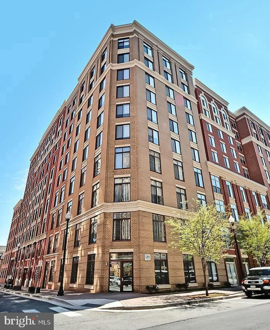 Now available—your perfect home in the heart of Clarendon! This beautifully upgraded 1-bedroom plus den condo is a true hidden gem, offering breathtaking views, including a stunning glimpse of the monument right from your bedroom. The open-concept layout is very spacious, featuring a gourmet kitchen with granite countertops, stainless steel appliances, and its own separate dining area. The large master bedroom includes a walk-in closet, while the master bathroom has been nicely upgraded with a new vanity and modern fixtures. The versatile den, complete with its own powder room, provides the perfect space for a home office or even a second bedroom.  Step onto your private balcony and enjoy a fresh cup of coffee in the morning or unwind with a glass of wine at night with a nice city view. The entire unit boasts wood floors, adding to the modern, clean look. Rent includes one parking space, with the option to rent a secondary space for a slightly extra cost. Residents enjoy top-tier amenities, including on-site management, a party room, and a swimming pool. Plus, a small discount is available at the Gold’s Gym located in the nearby 1205 Garfield building. Just a short walk from the Clarendon Metro, Trader Joe’s, Whole Foods, and a variety of restaurants and shops, this location offers unbeatable convenience. Don’t miss out—schedule your private tour today!