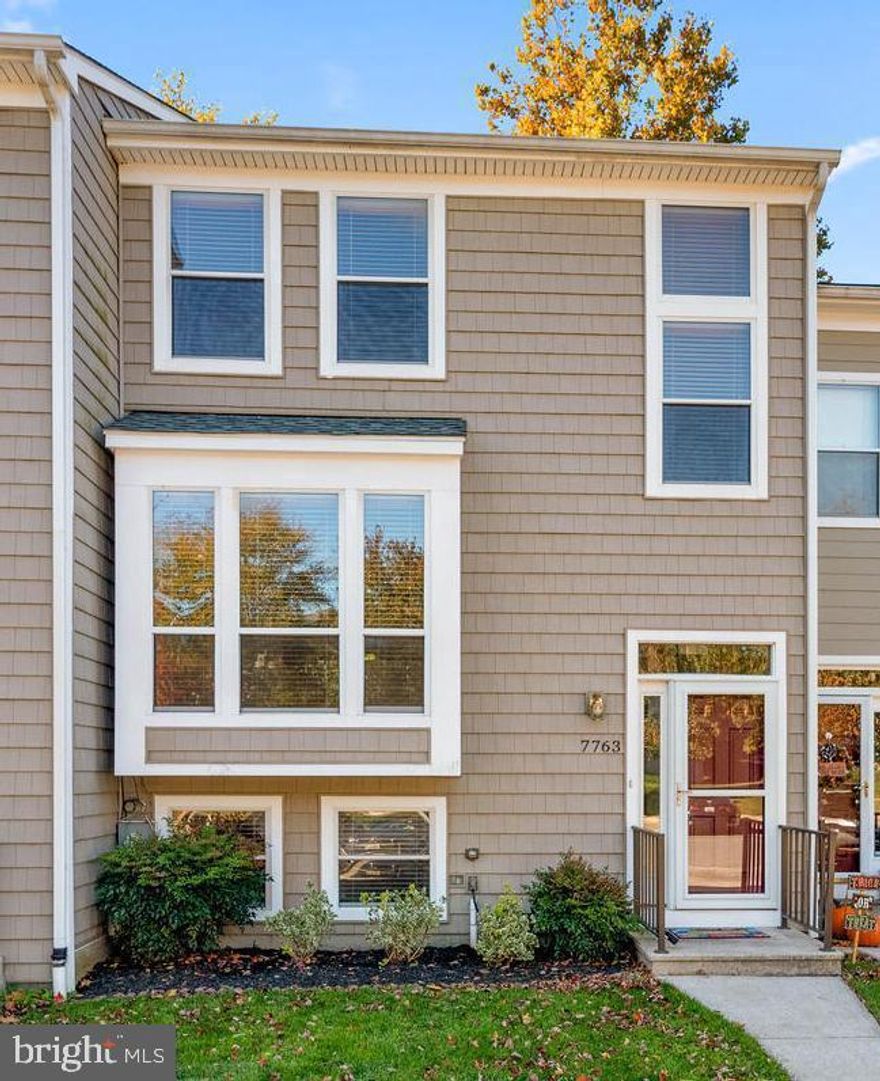 Price Improvement! Welcome home to 7763 Chatfield Lane located in WOODLAND VILLAGE. This Townhome offers stainless steel appliances and new flooring. Living room/Dining Room w/wood burning fireplace. Huge master suite w/ walk in closet.  2nd bedroom upstairs and 2nd full bath. Fully finished lower level w/walk-out, expansive rec room, washer/dryer, bedroom, and 3rd full bath. Huge deck w/stairs to access yard.  Community includes: Community Pool Access, walking trails throughout, near restaurants, major highways, and near tons of great shops! Walking distance to Bellow Springs ES. Schedule your showing today!