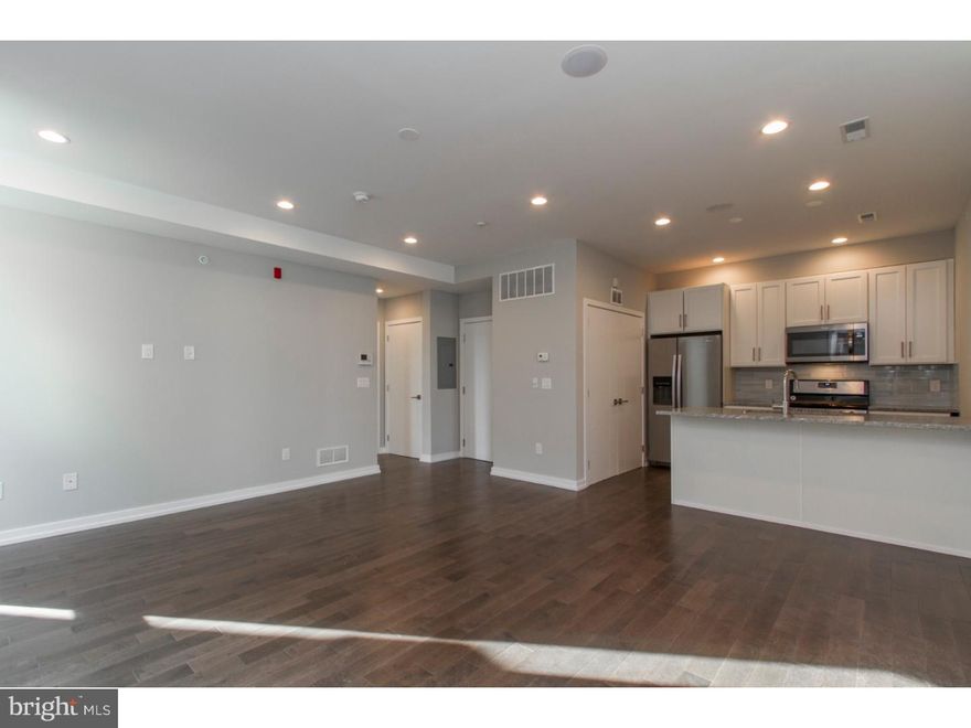 Welcome to Kater View, where top quality and comfort come standard. Located in the heart of the vibrant Bella Vista community, this light filled, pet friendly unit includes all the features on your wishlist, including hardwood flooring, video intercom security system, floor to ceiling windows, as well as a modern kitchen with granite countertops, stainless steel appliances and a gorgeous tile backsplash. Each bedroom has its own bathroom, complete with tiled, frameless glass enclosure shower, tile flooring, into the fabulous, light filled bedroom with large closet. The second bedroom is simply divine, with its attached bathroom which includes a shower & tub that is tiled to the ceiling. With additional perks such as a washer and dryer in the unit, semi private roof deck, large storage space in the basement, as well as a security system, 2 door cameras at the entrance, this is definitely a unit you need to see! Agent has ownership in property.