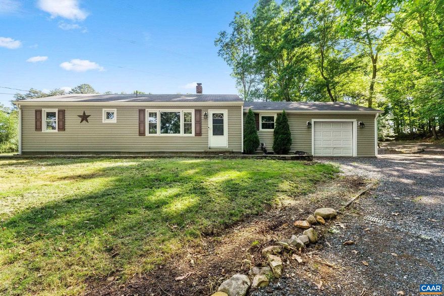 Presenting 256 Dooms Crossing, a meticulously updated home situated on a tranquil 1.24-acre parcel in Waynesboro, VA. This elegant 2-bedroom, 1-bathroom home seamlessly combines contemporary upgrades with the serenity of a wooded landscape.  Upon entry, you will be greeted by a fully renovated kitchen, showcasing refined countertops, beautiful cabinetry, and state-of-the-art and energy efficient appliances, catering to the discerning culinary enthusiast. The bathroom has also undergone a complete transformation, now featuring modern fixtures and finishes.  The open living area flows effortlessly to a generous outdoor patio, an ideal space for outdoor entertaining or for enjoying the peace and quiet of the surrounding natural beauty. This outdoor haven serves as a true extension of the living space, offering ample room for relaxation and leisure.  Additional features include a one-car garage, providing both convenient parking or supplementary storage. The extensive, predominantly wooded lot affords both privacy and an immersion in nature, making this property a genuine retreat.  The newly laid circle driveway makes access to the home easy, and could even accommodate an RV, or boat storage.,Wood Cabinets