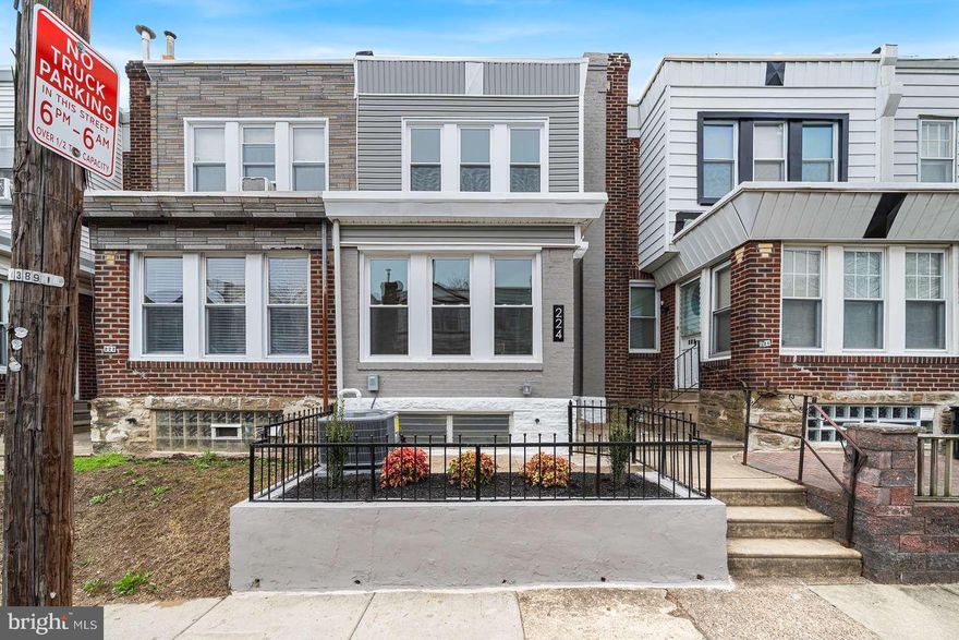STUNNING NORTH OLNEY GEM! Say goodbye to landlords and hello to homeownership with this beautifully renovated 4-bedroom, 2.5-bath gem in highly sought-after North Olney. Fully remodeled from top to bottom, this move-in-ready rowhome offers the space, style, and hassle-free living you've been seeking. Step inside to a bright, open floor plan filled with natural light, soaring ceilings, and elegant recessed lighting. Gorgeous refinished hardwood floors, brand-new windows & doors, and a brand-new Carrier HVAC system mean comfort and low-maintenance living for years to come. Love to cook or entertain? The dream kitchen delivers with brand-new white shaker cabinets, sleek stainless steel Whirlpool appliances, a stylish tiled backsplash, granite countertops, and a massive breakfast island perfect for that morning cup of coffee or weekend get-together with friends / family. Upstairs, the spacious primary bedroom features a generously-sized, double-door closet and modern ceiling fan ... a true retreat after a long day. Two more bedrooms and a chic, black-and-white full bath round out the upper level. But that’s not all ... the fully finished walkout basement adds nearly 500 sq ft of bonus space, including a private bedroom, full bathroom, lounge area, laundry, and a bonus flex room that’s perfect for a home office, gym, or guest suite. A private parking space at the rear of the home adds convenience to comfort. Perfectly located on a quiet street just minutes from Fisher Park, Olney Playground, shopping, dining, public transit, and major commuter routes like Route 1, 611, and Cheltenham Ave. Stop renting and start building equity in a home that’s ready to welcome you. Offering so much for the price, this home won't last long ... schedule your appointment today!