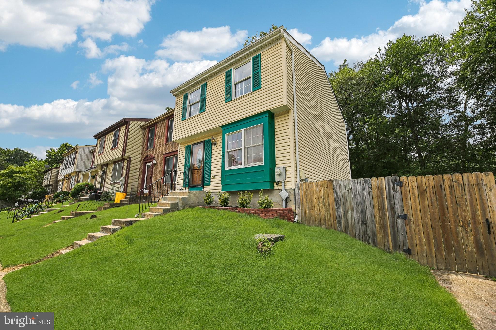 Here's the opportunity you've been waiting for. Don't miss your chance to own this cute & cozy, 3 bedroom, 2 bath END-OF-GROUP town-home with a fully fenced back yard! Take advantage of the corner lot with the extra land on the side. Appreciate the cleanliness of real hardwood floors on the main level. Notice the renovated kitchen with stainless steel refrigerator, dishwasher, built-in microwave, electric range. Take advantage of the fully finished basement with tons of natural light and walk out level sliders. Enjoy the convenience of the NEW lower level powder room. Have more piece of mind with a newer roof (2020) and NEW HVAC system (2024). Ideally located close to major highways, shops and more! Make an appointment to go see it for yourself today.