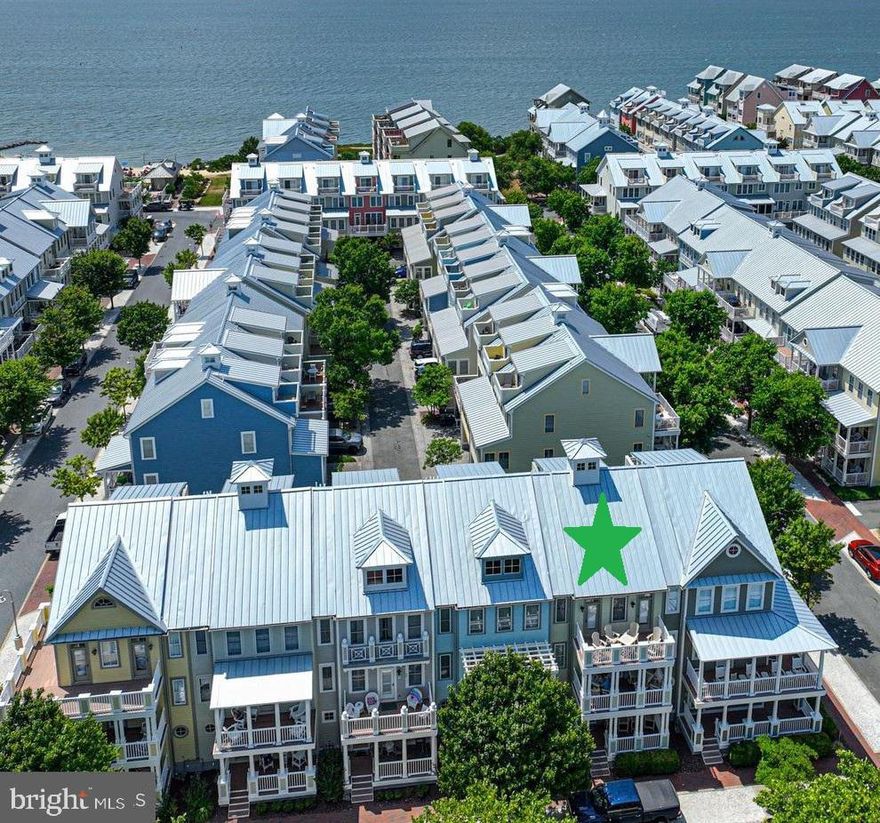 An extraordinary opportunity awaits on Sunset Island — a masterfully reimagined and extensively upgraded NV townhome that embodies coastal living at its finest.

 Ideally positioned in the heart of the island, this four-bedroom, four-and-a-half-bath coastal sanctuary is perfectly oriented to capture breathtaking eastern sunrises. Three expansive front porches overlook the community’s signature one-acre pond, where illuminated fountains create a serene and picturesque setting — a daily reminder that you are living somewhere truly special.

Designed for effortless elegance, the home showcases open-concept living at its best. Light-filled spaces flow seamlessly from the chef’s kitchen to the dining and living areas, creating an airy, sophisticated environment ideal for entertaining and relaxed coastal gatherings. Nearly every surface has been thoughtfully renovated, including beautifully refreshed flooring throughout. The redesigned staircase and railings introduce a refined modern coastal aesthetic, while the stunning first-floor bath — adorned with floor-to-ceiling custom tile and a built-in shower seat — rivals luxury resort design.

The spacious kitchen is both functional and impressive, featuring double ovens, a built-in microwave, expansive counter space, and abundant cabinetry — perfect for hosting sunset dinners or casual family mornings before a day on the water. Just off the main living area, the private rear three-season room offers an intimate retreat for morning coffee, quiet reflection, or hosting a classic Maryland crab feast.

Location elevates this offering even further. Just steps from the clubhouse, indoor and outdoor pools, bayside beaches, fitness center, and the beloved Tiki Bar & Restaurant — locally known as A Touch of Italy — and only 0.4 miles from the pristine shores of the Atlantic Ocean, this residence places you at the very center of island life.

Beyond the amenities, one of the most cherished aspects of life on Sunset Island is its warm, pet-friendly atmosphere. Residents and their four-legged companions enjoy daily strolls around the scenic pond, along the beautifully maintained streets, and throughout the one-mile walking trail. Morning walks by the water and sunset laps around the fountains create a sense of community that is both vibrant and welcoming — for you and your pets alike.

A private garage and outdoor shower add thoughtful convenience after sun-drenched beach days.

This is more than a home — it is a turnkey oasis, offering a rare chance to embrace the full Sunset Island lifestyle in 2026 and beyond. Enjoy the interactive fountain, seasonal General Store just steps away, and the unmatched charm of one of the Eastern Shore’s most coveted waterfront communities.

For the discerning buyer seeking the premier beach home on the market, this coastal sanctuary stands in a class of its own. Opportunities like this in such an exceptional, amenity-rich community are rare — jump on this chance to own in Sunset Island before it’s gone.

PLEASE NOTE - Living Room and Bedroom 3 are virtually staged.   Furniture is negotiable
