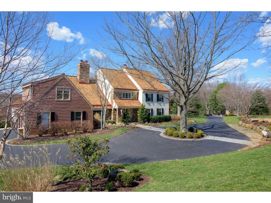 Positioned at the end of a long drive, find this 4-5 Bedroom 3/2 1/2 bath field stone Colonial, surrounded by  10.30 conserved acres with superior privacy, unparalleled views of meadows, resort quality pool, tiered terraces and pergolas.  Enter to a two story Foyer with handsome character grade, cherry floors, extensive paneled wainscoting and classic turned stair with balcony overlook.  To the left, through a wide cased opening, find an elegant formal Dining Room. An oversized window on the eastern facing wall and wood burning fireplace on the opposite while double doors open to the Kitchen, offering seamless flow when entertaining.  Sparkling, pure white Kitchen offers top quality stainless steel appliances including Sub Zero freezer and refrigeration, gas cook top and and double wall ovens.  Enjoying an open connection to the Kitchen,  Breakfast Room, highlighted by a gas burning fireplace, flows into a large Family Room.  Brightened by four sets of french doors which open to the walled terraces, grilling area and extraordinary conserved  grounds.   Dramatic story and a half Great room is warmed by furniture quality cherry millwork and a marble surround wood burning fireplace.  Custom shelving, TV cabinetry French doors was well as pocket doors returning to the family space  create a beautifully detailed and centrally positioned gathering area. Spacious first Level Master Bedroom overlooks the expansive rear grounds and offers a fireplace, walk-in outfitted closets, marble bath with large soaking tub and seated marble shower.  The second floor offers 3-4 large Bedrooms, two full Baths and generous storage.  Private, picturesque and ideally located in the heart of Chester County.