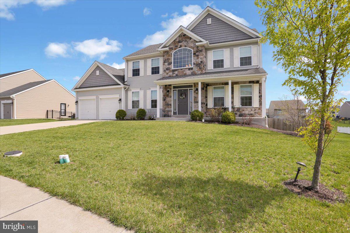 With approximately 4000 sq ft total finished living space and the potential to finish an additional 700+ sq ft, 2 kitchens and a fully fenced backyard on a lot totaling just under a half acre, this beautiful, well maintained home is move in ready in time for summer. This former spec/model home has all the upgrades one would expect as one of this development's showpieces when it was built just a few short years ago - kitchen cabinet crown molding, an upgraded wet bar/butler's pantry with backsplash and built-in wine rack, rounded drywall corners and so much more!! The open floor plan on the main floor has entry area cathedral ceilings (perfect for a colossal tree at the holidays), and an oversized eat-in kitchen with access to the large deck overlooking the fully fenced yard, an adjacent family room, a dining room that could also accommodate a home office and/or playroom, depending on lifestyle and tastes, and a gigantic living room area, perfect for relaxing with a book or entertaining. A mud-room, laundry room and powder-room area, complete with a bench for easily taking off boots and shoes, is accessible directly from the garage and kitchen, helps minimize clutter in the main living area, as do 2 closets and a pantry. The wet-bar area with recessed lighting is perfect for storing glassware, bottles, and snacks, keeping your kitchen cabinets and island cabinets free for storing dishes, plates, holiday trays and serving platters, small appliances, cookbooks, bakeware, etc. If cocktails and wine aren't to your liking, utilize this area as a coffee and tea bar, a watering station for your houseplants which are thriving in the natural daylight, or even as a display area for a few precious pieces of family heirloom china/vases/collector items!
Upstairs, the gorgeous, oversized primary suite offers space to recharge and unwind for the evening or to sneak away for a quick nap after a busy week. There's a luxurious spa-like bathroom with an enormous walk-in tiled shower, a double sink vanity, and a separate make-up vanity with lighting, to help with your stress-free time. There's also an incredible walk-in closet for organizing all of your clothing, shoes, outwear, etc. by season. Vinyl plank flooring throughout this level creates a streamlined and modern, yet warm setting. The hall bath and 3 generously sized bedrooms complete this floor.
Another amazing aspect of this home is found on the lower level. Downstairs awaits a complete 2nd kitchen of approximately 348 sq. feet (29x12), including a large island and a full-sized window, as well as a large, unfinished area that would lend itself well to a bedroom and/or an additional family room, in addition to the separate storage/mechanics area! This gives the next proud owner the opportunity to easily develop a private area in which to host in-laws, out-of-town guests, or recent graduates unsure of their next step. Or it could simply be the perfect area to hold future Super Bowl, March Madness, or Stanley Cup parties or the spill over from crowded birthday parties and holiday dinners. Add a half or full bathroom and your main floor won't even need to be used at those sometimes messy events!
A fully installed radon removal system will save you money, hassle, and worry. The fully fenced backyard is a great place for kids and/or dogs to play and there's plenty of room for adding a garden or more seating areas. A shed will help you keep your gardening tools, toys, and mower at-hand and tidy.