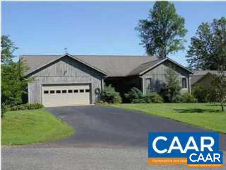 For Rent - Spacious one-level home in Greene Mountain Lake on a nice corner lot across from the lake beach. Spacious kitchen and rooms with attached oversized two-car garage. Large rear deck overlooking the lake from the back yard.