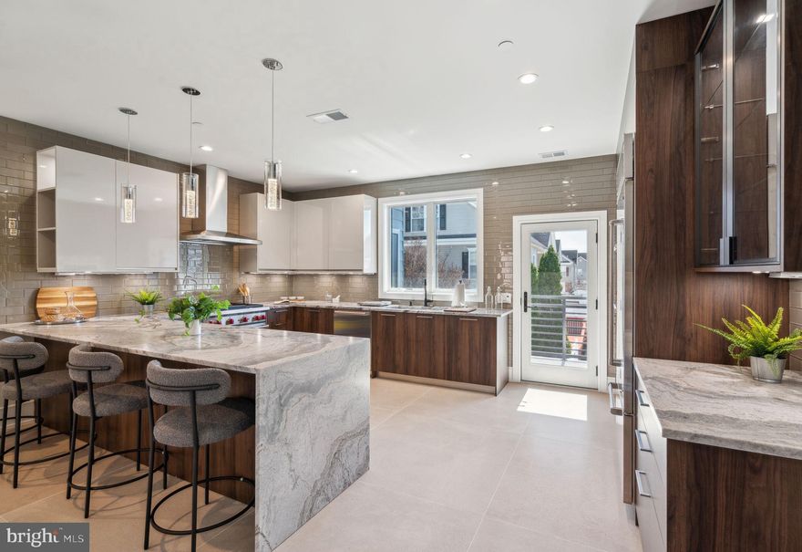 Welcome to 2006 Renaissance Walk, Unit 4—a pinnacle of modern luxury
nestled in Philadelphia’s prestigious Packer Park neighborhood. This newly
constructed townhome exemplifies sophisticated urban living, offering an
expansive 3,200 square feet of meticulously crafted space.
Property Overview:
    •    Price: $1,255,000
    •    Bedrooms: 3
    •    Bathrooms: 3 Full, 1 Half
    •    Square Footage: 3,200 sq ft
    •    Year Built: 2024
Exceptional Features:
    •    Gourmet Kitchen: The culinary heart of this home is adorned with
European-imported Porcelanosa cabinetry, complemented by premium granite
countertops. State-of-the-art appliances, including a Sub-Zero refrigerator and
Wolf range, appealing to the most discerning chefs.  
    •    Elevated Living Experience: A private 4 person, five-stop elevator
ensures effortless access across all levels, enhancing both convenience and
accessibility.  Each level of living is adorned with Porcelanosa tile, french oak
hardwood flooring, custom closets by Closet Works, recessed LED lights, Dual
Zone HVAC, Anderson 440 Series windows, Navien tankless water heater, water
pressure booster pump and much, much more.
    •    Luxurious Primary Suite: The expansive primary bedroom serves as a
serene retreat, featuring a spa-inspired en-suite bathroom with Kohler faucets,
Duravit fixtures, a free-standing soaking tub, and an oversized glass-enclosed
shower.
    •    Outdoor Entertaining: Multiple decks, including a rooftop oasis, offer
panoramic views of Philadelphia’s skyline, providing idyllic settings for relaxation
and social gatherings.
    •    Smart Home Integration: Advanced smart home technology seamlessly
controls lighting, security systems, and climate settings, ensuring a modern and
secure living environment.
    •    Parking: A spacious two-car garage provides secure, off-street parking
with direct access to the residence, with ample extra space for extra storage 
Community and Location:
Renaissance Estates is an exclusive enclave of 14 custom townhomes, with only five homes still available.   Packer Park is a highly desirable, safe, community.  Residents enjoy proximity to lush green spaces like FDR Park, the vibrant Sports Complex, and Live! Casino, offering a dynamic blend of leisure and entertainment options.  
Convenient access to major thoroughfares, including I-95 and the Walt Whitman Bridge and within 7 Minutes of International Airport.   Packer Park ensures effortless connectivity to the broader Philadelphia area and beyond.   
Contact Information:
For a private viewing or more information, please contact:
Barbara A. Capozzi, Esq.
Associate Broker, EXP Realty, LLC
     •    Office Address: 3310 South 20th Street, Philadelphia, PA 19145
Experience unparalleled luxury and modern living at 2006 Renaissance Walk,
Unit 4—a residence that truly embodies the essence of a sophisticated urban lifestyle.