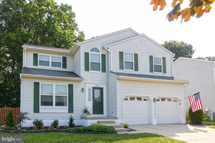 Beautiful, updated, and well maintained home in highly desirable Harting Farm.    This home boasts a renovated kitchen with breakfast room, new hardwood floors on main level,  gas fire place with marble hearth, fully finished basement level, and two car garage.  Great yard with large deck perfect for relaxing or playing.  Community amenities include Olympic size poor, clubhouse, playground.