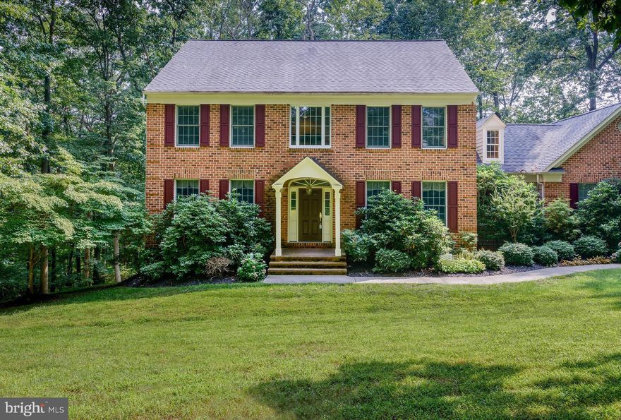 ***ACCEPTING BACK-UP OFFERS***Want a home with an Irish Pub? Here's your chance with this custom built colonial offering over 5,000 sq ft of finished living space on 3 acres in desirable Cameron Mill featuring hardwood floors, open eat-in kitchen, coffered ceilings, gas fireplace, large deck, finished walk-out basement with exercise room, Passive Wine Cellar, Sought-after schools & much more.