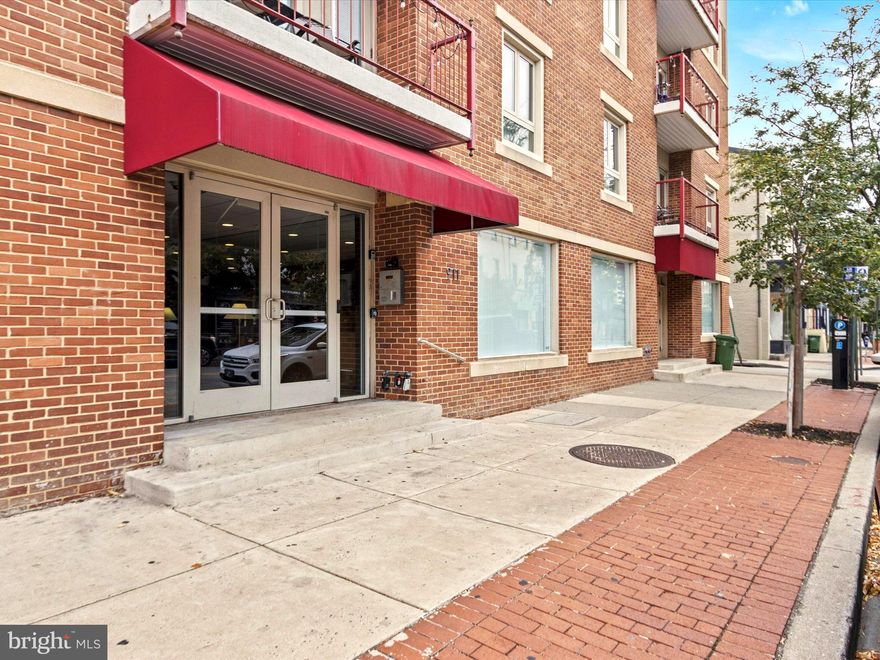 Step into refined city living at 911 S Charles Street, Unit #409, a beautifully maintained two-bedroom, two-bathroom condominium situated in the heart of Baltimore’s vibrant and historic Federal Hill neighborhood. This bright and inviting home blends modern comfort with timeless charm, featuring refreshed flooring, contemporary kitchen and bath finishes, and a spacious open-concept living area anchored by a cozy fireplace—perfect for relaxing or entertaining. The residence also includes in-unit laundry for added convenience and is move-in ready, offering a seamless transition to your new urban lifestyle.
From your doorstep, enjoy everything that makes Federal Hill one of Baltimore’s most desirable addresses. Stroll to the lively Cross Street Market, the Inner Harbor, and M&T Bank Stadium, or explore the neighborhood’s many dining, shopping, and entertainment options. With easy access to major employers and universities—including Johns Hopkins, the University of Baltimore, the University of Maryland, and Under Armour headquarters—this home combines style, comfort, and unmatched convenience for students, professionals, and families alike.