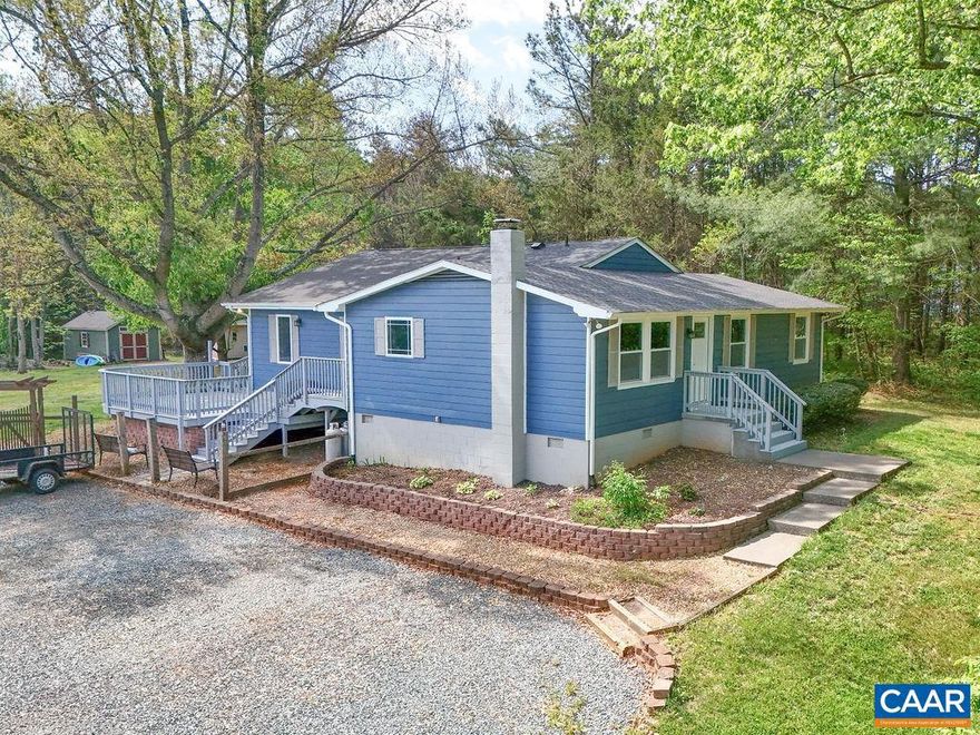 Amazing 2 acre property in North Garden Albemarle County!  North Garden is conveniently located minutes from 5th Street Station and just 25 minutes to Downtown Charlottesville.  Completely updated ONE-LEVEL Living!  Open floor plan - great for entertaining. Home renovations include: updated kitchen including all stainless steel appliances; granite countertops; new backsplash; new designer cabinets; New Roof(2 years old);  many new windows; Newer Trane HVAC system only 5 years old. Other renovations include: New LVP and Tile flooring; Both full bathrooms updated; Wood burning stove; new shelving; new lighting throughout the home; Hardie-plank siding; exterior and interior painting. Property is minutes away from Walnut Creek Park. Enjoy the beautiful landscaping & MOUNTAIN VIEWS from the spacious deck.  Property includes a well built Chicken Coop and two large storage dwellings for all your lawn equipment and extra storage.  Tremendous VALUE for an updated 4 bedroom home sitting on 2 acres in Albemarle County in a desirable school district! A must see!