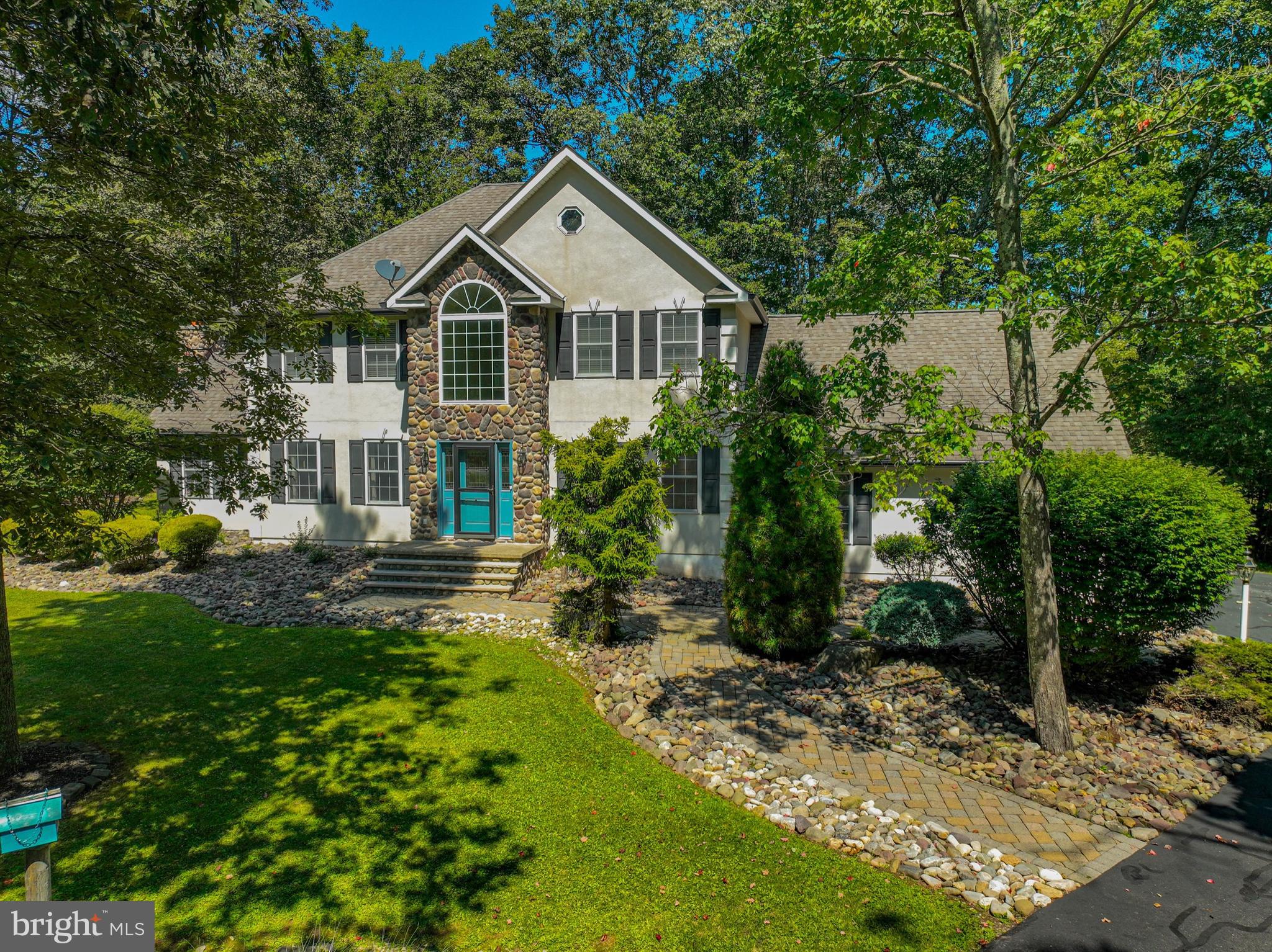 ALL THE COMFORTS IN A BEAUTIFUL, PRIVATE, PEACEFUL SETTING! Nestled on a partially wooded 1.01 acres in the community of Hillside Hollow, this spacious custom-built 4-BR, 2.5BA Colonial has something to offer everyone in your family! The open foyer invites you to a formal living, that can be used as a den or office, and dining rooms that connect to a fully equipped, gourmet kitchen featuring wood cabinets, granite countertops, tile backsplash, stainless appliances, and a center island that comfortably seats 2! A spacious family room, with wood floors, adjoins a "GREAT" room with a floor to ceiling stone hearth fireplace to the tongue n' groove vaulted ceiling. A spacious master ensuite is luxurious with a large closet and jetted soaking tub, glass tiled shower, double vanity and tile floors. Three sizeable bedrooms and full bathroom are on the 2nd floor. The (14' x 22') all season's room, perfect for your morning coffee, just relaxing, features a tongue n' groove vaulted ceiling exits out a tiered Trex deck and spacious rear private fenced in yard! Full unfinished basement with high ceilings, perfect for your storage, gym or additional family needs. A long winding driveway leads to a 2 car garage. Beautifully landscaped gardens, rolling greens and stately shade trees are all apart of this homes beautiful setting! SHOWN WITH PRIDE!