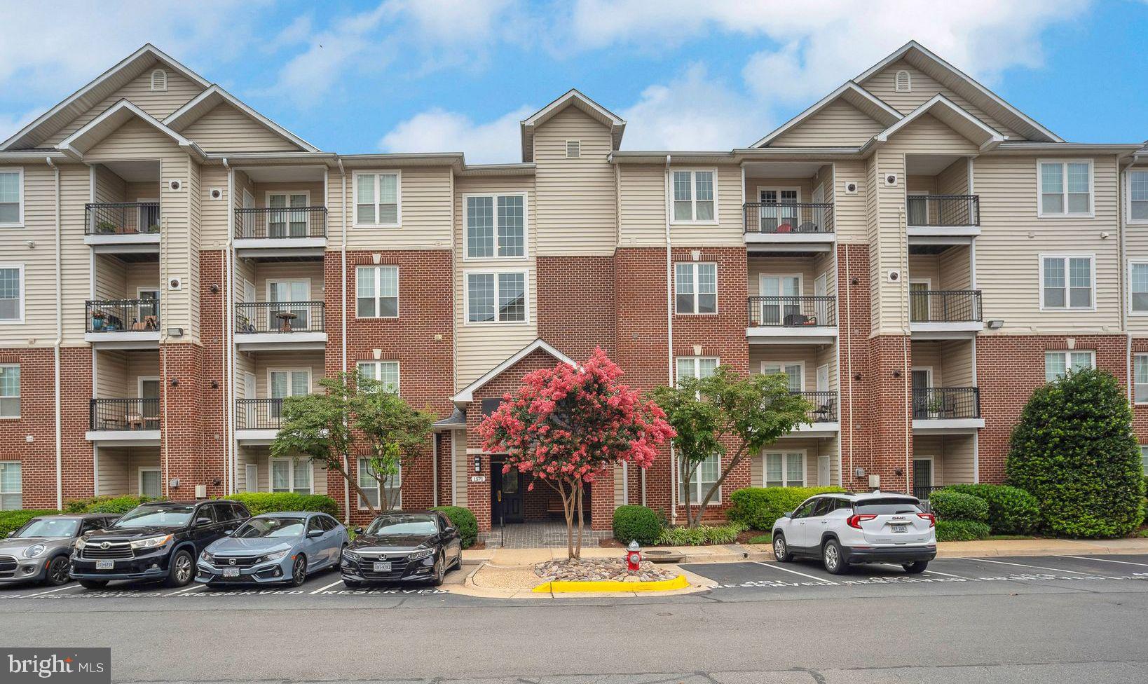 Turn-key 3rd floor unit awaits ! Tastefully decorated, practically improved, meticulously maintained property shows the proud home ownership. Renovated kitchen with recent year smart fridge, replaced chef-grade faucet, numerous cabinet and door racks provide storage solution. Dining/living room combo has gas fireplace. Living room balcony overlooking greenery and vibrant fall colors, provides complete privacy and a perfect spot to relax.<p><p>
Master bedroom has renovated en-suite full bath and walk in closet with organizers. 2nd bedroom has equally impressive walk in closet and large bathroom. It also provides rental income ($1200+) if needed.
HVAC and fridge: 2020. Energy efficient building allows for minimum utility usage. <p><p>
2 assigned parking spaces!! 1 in covered garage, 1 on surface <p><p>
Convenient location close to major thoroughfares: Tysons Corner, dining/shopping/fitness clubs/supermarkets including Wegmans, public entertainment venues like Capital One Hall, plus many major employers. Famed school cluster. Well managed community has rich amenities including pool, club house and gym.<p><p>
Hearts race, spines tingle, breaths quicken … The total package. Wrap it up.<p><p>
Note: Some photos show owners' furniture and/or virtually staged; Sellers are willing to paint with neutral color with acceptable contract.