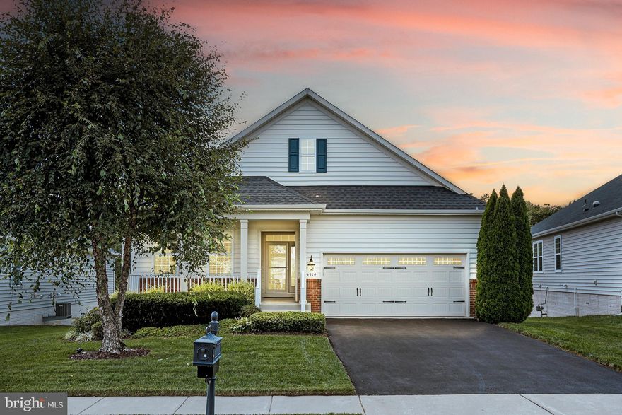 LOCATION, LOCATION, LOCATION!!!
Welcome to your dream home in the sought after 55+ community of Virginia Heritage at Lee's Park! This meticulously maintained and move-in ready 4-bedroom, 3-bathroom residence offers the perfect blend of modern amenities and serene living.  Enjoy the ease of single-level living with an open floor plan that connects the living, dining, and kitchen areas in a seamless flow, perfect for entertaining and everyday living. A cozy gas fireplace that adds warmth and ambiance is visible from all the areas of this open floor plan. 2 Additional bedrooms and a full bathroom are located in the front of the home for added privacy guests or a home office.
This residence is situated on a prime lot with a private yard that backs onto a vibrant tree line, offering an idyllic view from the covered porch - which may become your favorite spot to relax and enjoy the outdoors. The gourmet kitchen is equipped with stainless steel appliances, gas cooktop, wall ovens, and a large island. The main level primary bedroom features a spacious layout, 2 walk-in closets, and an ensuite bathroom with a step in shower & soaking tub. The finished walkout basement includes an oversized  recreation room, a full bath, and an additional bedroom with large walk-in closet, AND over 800 sq ft of storage space with  workshop bench, and space for crafts or hobbies.  The attached two-car garage has an additional conditioned storage space.  Sidewalks surround the area for your morning run or evening stroll with friends. Outside of the home, the amenities of this active adult community await, including a well-appointed Club House with indoor/outdoor pools, billiards, a library, concierge services, exercise classes, meeting rooms, and scenic walking trails. Additional conveniences include trash and snow removal, a security gate, and proximity to shopping, hospitals, transportation, and downtown Fredericksburg. This home offers a lifestyle of unparalleled comfort, convenience, and community. Don't miss your chance to experience luxury living at its finest – schedule your viewing today!