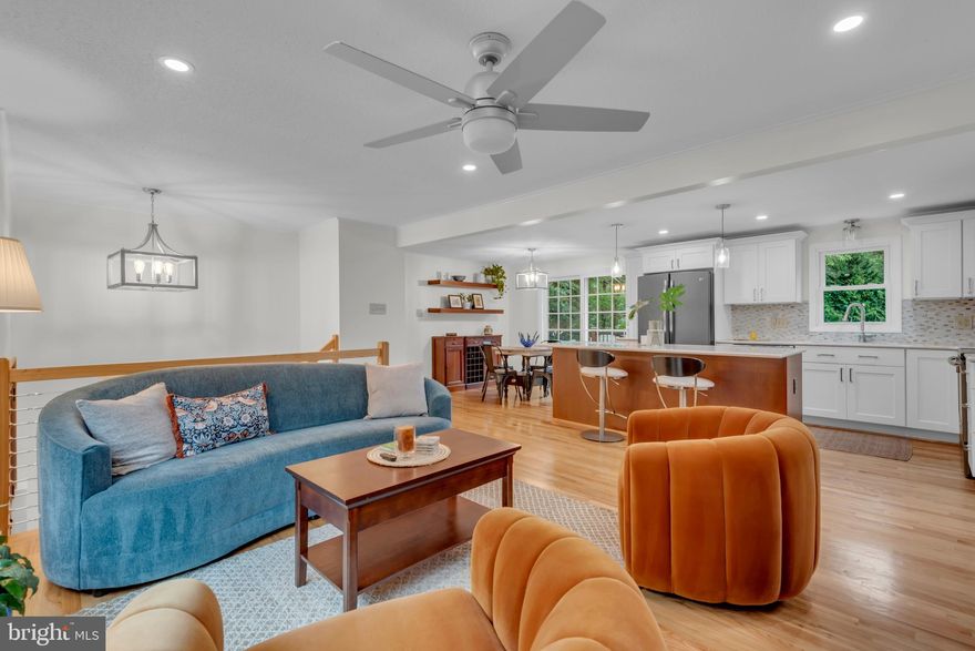 Welcome to 148 Cresston Road, a thoughtfully redesigned home in Arnold on an oversized private lot that backs to woods.  This residence was recently remodeled, creating modern comfort with classic style, featuring gorgeous hardwood floors and sun-filled living areas.  A beautifully renovated kitchen with a large island, stunning white cabinetry, and quartz countertops opens to the main living room for great conversation and entertaining.  The addition of a new lower-level primary suite provides a private retreat, while the flexible layout offers space for work, play or relaxation. Step outside to enjoy the expansive yard—fully fenced for privacy and perfect for pets, play, or gardening—and a large deck ideal for entertaining and outdoor dining.  Enjoy the added benefit of community street end waterfront access for small watercraft within quick walking distance from the house.  All just minutes from Broadneck schools, Anne Arundel Community College, Bay Hills Golf Course, shopping, dining, downtown Annapolis, and commuter routes to Baltimore and Washington, D.C.  Please see floor plans for accurate square footage.