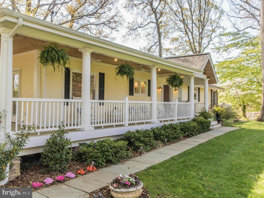 Price adj.  Elegant sun drenched waterfront, .90 acre.  Completely renovated open floorpan and wonderful views of the gently sloping lawn and approx 155 ft deep waterfront, dock, 2 boat slips.  Walls of glass and french doors between the great room and more formal dining and living area.  Gourmet kitchen is the heart of the home in one of Annapolis's most desirable neighborhoods.  Faces Ag. Trust.