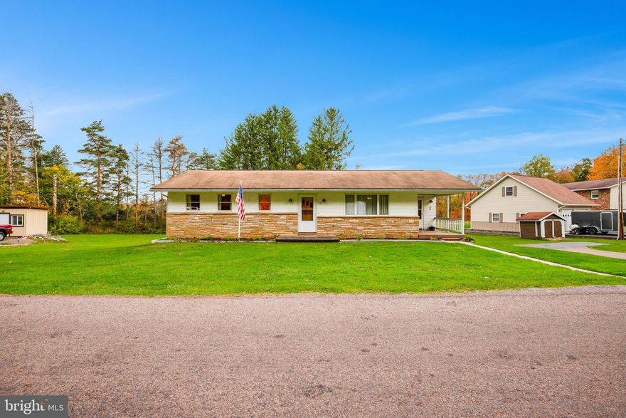 Out of town Rancher! Located on .4 acres, this 3 BD 2 BA (1 on the Main floor and 1 in Basement) has large bedrooms and plenty of living space! Kitchen/dining combo has plenty of room to host your gatherings. Full basement with 1 car integral garage. Public water with on lot septic. Close enough to town for shopping and hospitals. Lower taxes make this a bargain! One level living with washer and dryer hookup on the main floor. Minimal steps into the home, make accessibility easier.