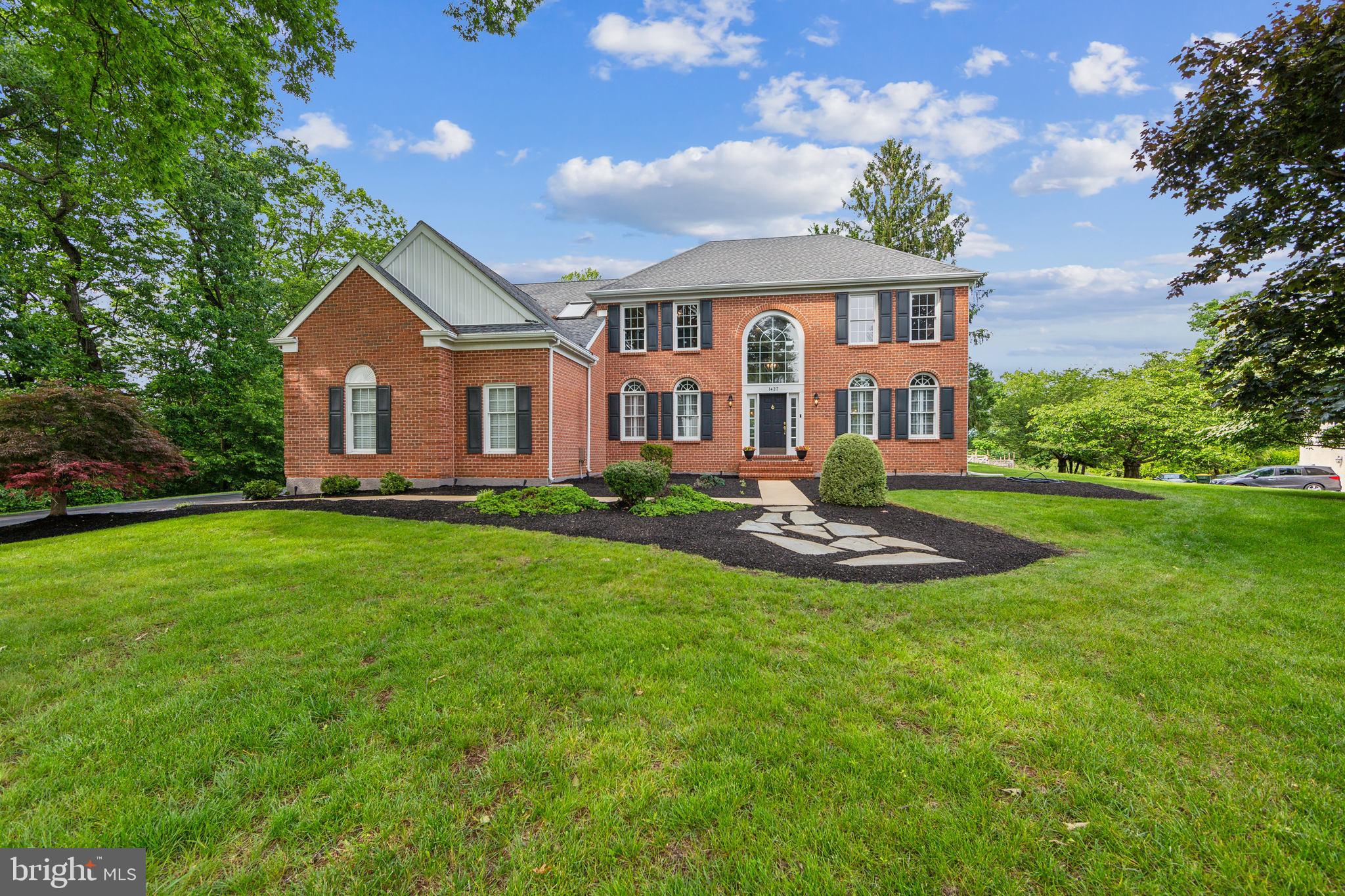 Wait no more...an exceptional 5BR/4.5BA estate home with 4,300+ sq ft of finished living space, set on nearly 3.6 private acres in Brandywine Ridge, one of Chester County's most desirable communities. Located in the award-winning Downingtown Area School District, home to PA's #2 STEM high school (US News and World Report). From the moment you approach this elegant brick facade and newly installed Hardie board siding, the craftsmanship and attention to detail are immediately apparent. Step inside to discover architectural finishes centered by a curved staircase with wrought iron spindles framed out walls along with rich hardwood floors that flow throughout most of the main level. An executive-style home office, ideal for remote work or quiet study along with a formal living and dining room with a grand crystal chandelier to entertain. . The heart of the home is the gourmet kitchen, complete with marble countertops, high-end stainless steel appliances, 42" cabinetry with glass inserts to showcase your special pieces! A large Palladian window to admire the sprawling backyard also brings an abundance of sunlight to highlight this magnificent island! Two inch thick marble countertop adorned with ornate finishes to gather! The kitchen moves beautifully to the family great room with vaulted ceiling and exposed beams. The custom built-in shelving and cabinets surrounds a wood burning fireplace with marbled surround! Easy access to an oversized deck to entertain as well as a custom fire pit to enjoy! A mudroom with custom built-ins and a three car garage to wrap up this main level. Generously sized bedrooms provide comfort and privacy, including a luxurious primary suite with a spa-like ensuite bath. White and gray marble finishes, custom cabinets surround dual vanities, an oversized soaking tub and walk in shower! As well the laundry room has been moved to the primary bedroom for convenience. There is a princess suite with a full bath for that special someone as well as two additional bedrooms to share a hall bath with dual sinks! The fully finished lower level offers additional living space. Getting ready for the big game or gather your friends at this gorgeous wood bar and bar stools, game area with wet/dry bar, pool table and more! Guest quarters with a full bath that is also used as a gym ... it is here! Accessible via a private drive, this home offers the rare combination of seclusion and convenience just minutes from major routes, shopping and dining. Don't miss your chance to own this one-of-a-kind residence in one of Chester County's most desirable communities!
