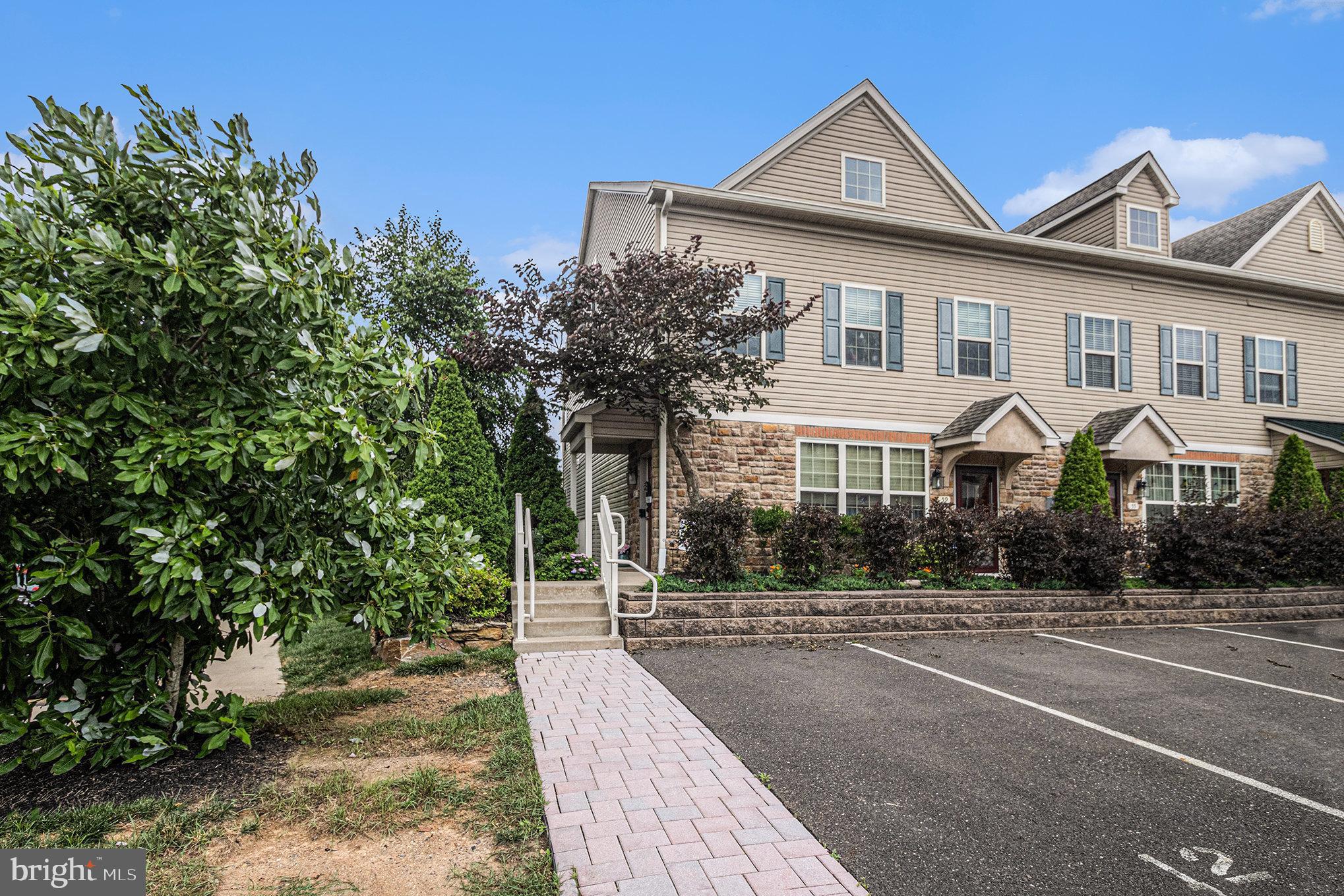 Convenience, comfort, location, and low maintenance are key for carefree living, and this property delivers it all. Discover a truly special home maintained by its sole owner since construction. Nestled in the sought-after Emerald Walk Community is an end unit townhouse in a quiet cul-de-sac. An amazing opportunity located in the highly ranked Neshaminy School District, within walking distance to the train station and minutes from major corridors. Enjoy a community that maintains the roofing, siding, and landscaping, so you can spend your free time relaxing in the pool with a cabana and changing area/bathroom, kids' playground, or strolling along the scenic sidewalks. Other amenities include snow removal, trash removal, and visitor parking.
Enjoy the private side covered entry as you step up into an inviting open concept layout with a soaring two-story living room featuring recessed lighting with a dimmer switch and extended ceiling fans. The cozy stone fireplace is perfect for entertaining. The well-thought-out kitchen is a chef's delight, equipped with 42-inch slow-close cabinets, stainless steel appliances, granite countertops, a gas range, a built-in microwave, custom backsplash, and a large island with seating, storage, and electric. The primary suite is located on the main level, boasting a private balcony and a large walk-in closet. The spacious en-suite bathroom has a granite double sink, a tiled shower with glass doors, and a linen closet. The second bedroom is flooded with natural light and has an oversized closet. The laundry room is conveniently located in the hall on the main level, as well as another linen closet. Spacious versatility enhances the dramatic upstairs loft, which overlooks the living room. The loft features two walk-in closets perfect for a third bedroom, game room, craft room, office, meditation space, or home gym. The water heater was replaced in April 2025 with a transferable warranty. Garbage disposal was replaced in 2024.
An absolute must-see that is not to be missed. You can't beat the location or amenities. So, hurry home to this remarkable find.