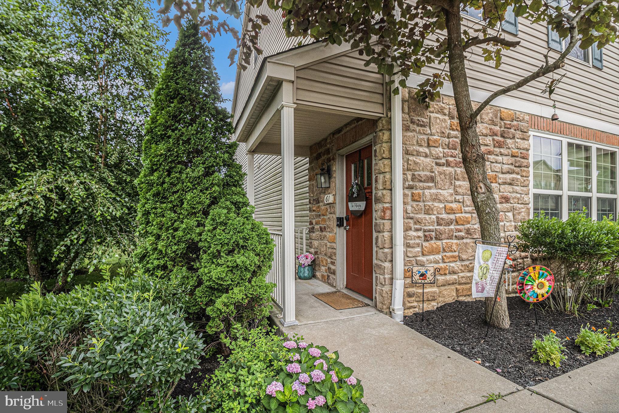 Convenience, comfort, location, and low maintenance are key for carefree living, and this property delivers it all. Discover a truly special home maintained by its sole owner since construction. Nestled in the sought-after Emerald Walk Community is an end unit townhouse in a quiet cul-de-sac. An amazing opportunity located in the highly ranked Neshaminy School District, within walking distance to the train station and minutes from major corridors. Enjoy a community that maintains the roofing, siding, and landscaping, so you can spend your free time relaxing in the pool with a cabana and changing area/bathroom, kids' playground, or strolling along the scenic sidewalks. Other amenities include snow removal, trash removal, and visitor parking.
Enjoy the private side covered entry as you step up into an inviting open concept layout with a soaring two-story living room featuring recessed lighting with a dimmer switch and extended ceiling fans. The cozy stone fireplace is perfect for entertaining. The well-thought-out kitchen is a chef's delight, equipped with 42-inch slow-close cabinets, stainless steel appliances, granite countertops, a gas range, a built-in microwave, custom backsplash, and a large island with seating, storage, and electric. The primary suite is located on the main level, boasting a private balcony and a large walk-in closet. The spacious en-suite bathroom has a granite double sink, a tiled shower with glass doors, and a linen closet. The second bedroom is flooded with natural light and has an oversized closet. The laundry room is conveniently located in the hall on the main level, as well as another linen closet. Spacious versatility enhances the dramatic upstairs loft, which overlooks the living room. The loft features two walk-in closets perfect for a third bedroom, game room, craft room, office, meditation space, or home gym. The water heater was replaced in April 2025 with a transferable warranty. Garbage disposal was replaced in 2024.
An absolute must-see that is not to be missed. You can't beat the location or amenities. So, hurry home to this remarkable find.