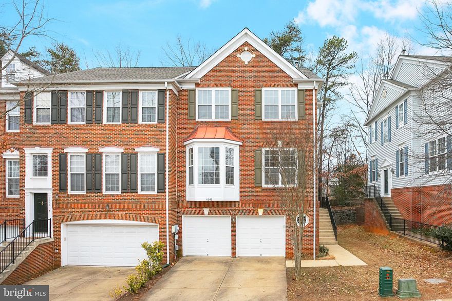 Discover the charm of this classic end-unit townhouse, offering 3 bedrooms and 3.5 baths.  Sunny kitchen opens into a den with plenty of space for all to congregate. Kitchen features eat-in table space with bay window for lots of light. Enjoy granite countertops, stainless, wood cabinets, recessed lighting, and pantry for plenty of storage. Den area features a cozy gas fireplace with marble surround, and room for extra seating. Main level also offers dining area with beautiful moulding, living area with walk-out to deck, separate office space, and convenient half bath. A spacious two-car garage features two separate bays/doors each with their own opener, and additional storage space. The long list of 2025 updates and upgrades includes: new roof, new stainless refrigerator and garbage disposal, new granite countertops, new light fixtures, new carpet on all three levels, and freshly painted top to bottom. AC new in 2022, and water heater replaced in 2021. This home is truly move-in ready.