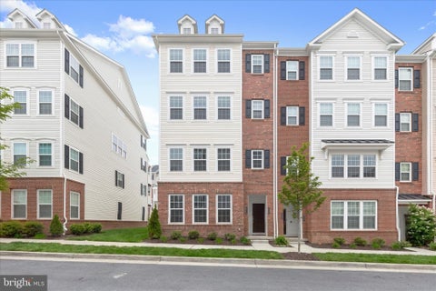 Photo of 4523 Reaney Ln #499, OWINGS MILLS, MD 21117 (MLS # MDBC2161098)
