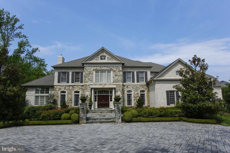 Spectacular Gulick Colonial on just under 2 acres.  Upgrades and custom finishes on all 3 levels including an amazing resort like backyard with pool, spa, fireplace and patio.  Very spacious 5 bedrooms on upper level and a bonus room with full bath over 4 car-garage.  Walk-out Lower level with Recreation Room, walk-behind Wet Bar, Media Room, Game Room, Den. Special Custom hardscape and landscape!