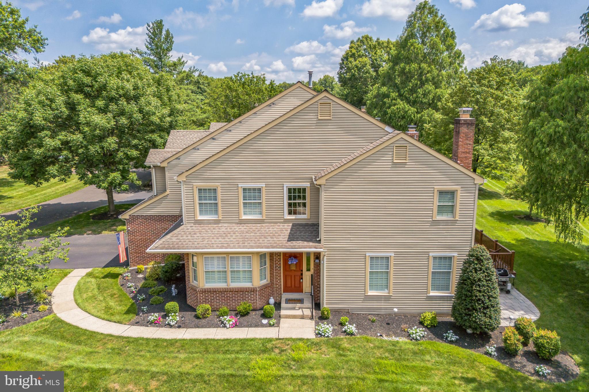 Welcome to this exceptional, fully renovated 3-bedroom, 2.5-bath end-unit townhome with a one-car garage, where thoughtful design and high-quality craftsmanship come together to create a truly turnkey living experience. Set in a peaceful and scenic location, this home offers sweeping views of open fields and lush landscaping, all visible from your private outdoor spaces. Enter the front of the home, where the foyer is flanked by both the living room and the family room, creating a sense of balance and thoughtful design from the moment you arrive. Rich ¾-inch hardwood flooring flows seamlessly throughout the main level and continues into the expansive primary suite upstairs, reflecting the home’s cohesive and well-considered design. The living room is warm and welcoming, featuring a gas fireplace with a striking brick surround that serves as a focal point and adds timeless charm. A graceful brick archway leads to the adjacent dining room, where French doors open to a brand-new Trex deck with a privacy wall—perfect for relaxing mornings or evening entertaining, all set against a backdrop of uninterrupted green space. The kitchen is a true standout, offering custom cabinetry, sleek stainless appliances, a built-in microwave, pantry, and an overall layout that balances beauty with function. A built-in sound system enhances the main level, creating an elevated, integrated living experience. Just off the foyer, the family room features a custom wet bar with beverage drawers and a beer meister—ideal for hosting guests or watching the big game in style. A practical and stylish mudroom completes the main level, with brick flooring and custom cabinetry, offering the perfect place to keep everything organized and has direct access to the garage. Upstairs, the primary bedroom suite is a tranquil retreat, complete with hardwood flooring, shiplap accent walls, custom cabinetry, and a spacious walk-in closet. The luxurious en suite bathroom feels like a private spa, with a soaking tub, separate shower stall, dual-sink vanity, and ample storage. Two additional bedrooms offer generous space, ceiling fans, and custom interior shutters. The second-floor laundry room is outfitted with upper and lower cabinetry, a utility sink, and a full closet—making daily routines more efficient and enjoyable. A full, unfinished basement provides endless opportunities for future living space, a home gym, or abundant storage. In addition to the 2020 Trex deck, a 2024 garage door upgrade with an automatic opener enhances both convenience and curb appeal. Additional highlights include all new windows, custom interior shutters throughout, replaced exterior and interior doors, ceiling fans in all bedrooms, and a complete renovation of every bathroom. The entire home (including getting rid of the step down to the living room!) was redone in 2019 with quality, comfort, and longevity in mind. The location truly completes the package—situated in the highly regarded Wissahickon School District and just a short walk to Spring House Village, where you'll find Starbucks, Whole Foods, Arpeggio, CVS, and more. Plus, direct access to nearby walking trails makes this gem even more appealing. Minutes to Ambler and Ft. Washington Train Station and downtown Ambler as well as Trader Joe's Regal Movie and more. Whether you're looking for peace and privacy, a beautiful setting, or move-in-ready style, this impeccably maintained home offers a rare opportunity to have it all.