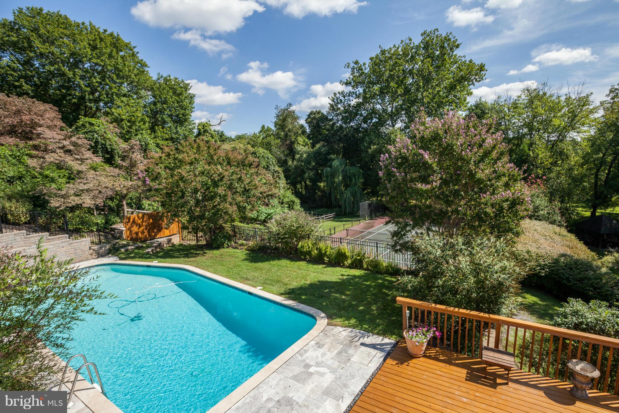 NEW PRICE/AMAZING VALUE! COUNTRY CLUB LIVING, 6,800 finSF COL w GORGEOUS VIEWS, 2 STORY GREAT RM w SOARING STONE FPL, 5BR/5.5BA,RENOV GOURMET KIT ADJ TO SPACIOUS FAM RM & SUN RM, ELEGANT LIV&DIN RMS MADE 4 ENTERTAINING! MSTR STE w SITTINGRM (OPT 6TH BR)+HIS&HERS FAB BATHS. 4 UPPER FBs RENOV 2013. W/O FIN LL w/ OPEN REC RM, AU PAIR STE w/ KITCHNTTE, FB & HOME GYM. POOL & TENNIS ON BREATHTAKING 2 AC