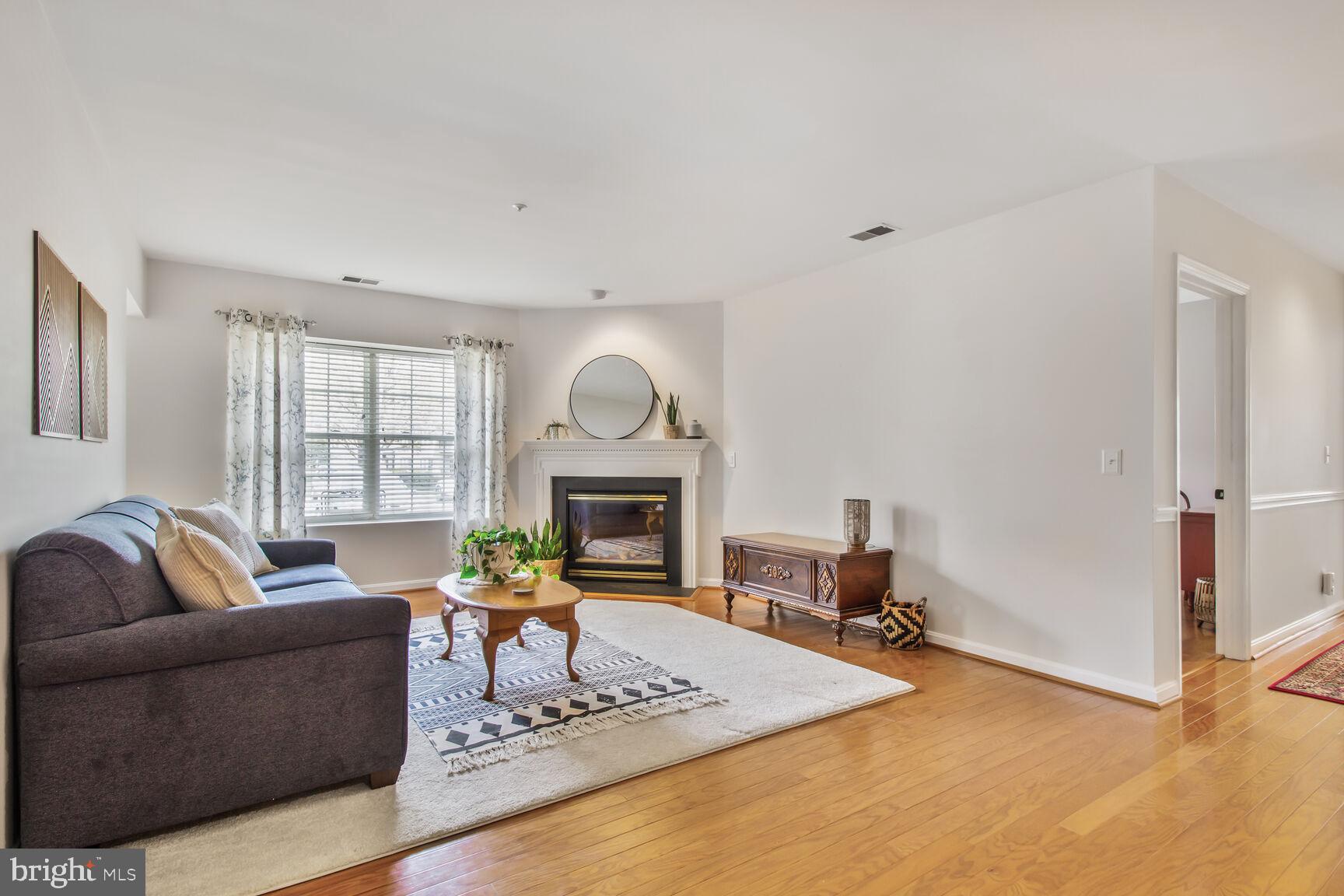 The Good Life Awaits With This Well Maintained, First Floor, Tullamore Condominium Home In Secured Building With Great Location. All Ages Are Welcome & Let Others Do The Grass & Snow! Desirable Corner Unit Is Filled With Natural Light & Has It's Own Private Entrance. Freshly Painted With Brand New Furnace & Central A/C System. Features Beautiful Wood Floors, Gas Fireplace, Kitchen With Granite Counters, Primary Bedroom With Full Bath & Walk-in Closet, & Patio With Storage Area. Walking Distance To The Roundwood Center's Shopping & Medical Facilities & Traffic Light At Community Entrance Provides Easy Access. Schedule Your Private Showing Appointment Today!