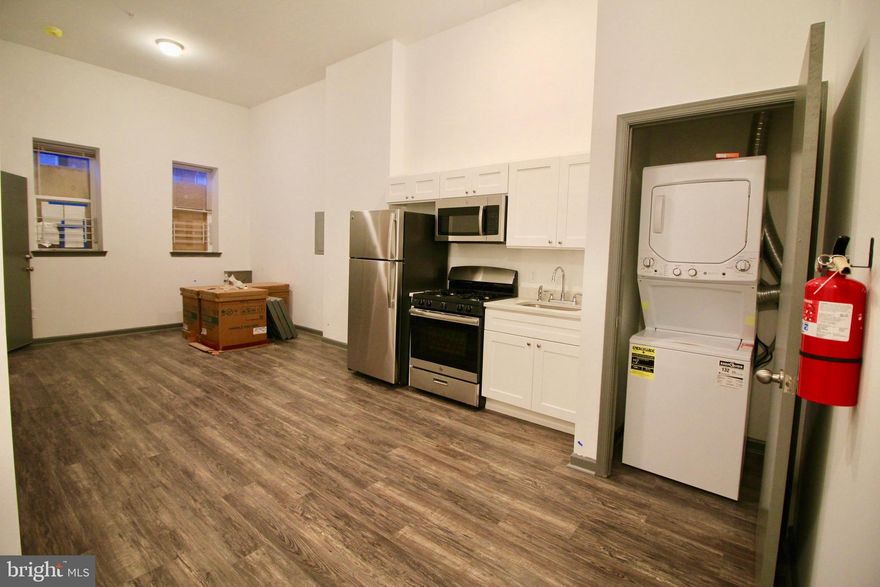 Brand new, never lived located right on Temple Medical Campus!  3rd floor unit is a large 1 bedroom w/ loads of natural light.   All units have brand new kitchens w/ stainless appliances, granite counters + white cabinets. Each unit has new washer/dryer, never used bathrooms, hardwood flooring, high efficiency central ac/heat, high ceilings, new windows, paint + fixtures. Entire building has fire alarms + sprinkler systems.   Too much to list!.  Units are available NOW or no later than May 1st lease inception date.  Easy to show