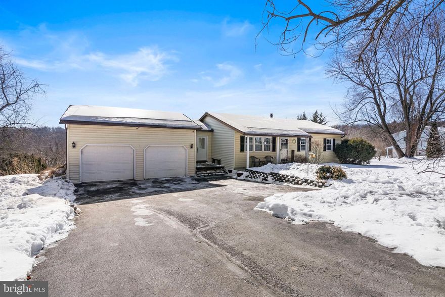 Peace, tranquility, and the soothing sounds of nature await. Welcome to 236 Hill Rd in picturesque Honey Brook, right in the heart of desirable Chester County. If you’ve been craving space, privacy, and a true escape from the daily grind, this is it. Set on a full acre of usable land, this beautifully maintained 3-bedroom, 2.5-bath ranch offers comfort, functionality, and room to breathe — inside and out. A spacious 6+ car driveway and attached two-car garage ensure you’ll never be short on parking for guests, hobbies, or extra vehicles. Step inside to a bright, open living room filled with natural light and anchored by a cozy propane fireplace — the perfect place to unwind after a long day. The kitchen is spacious, charming, and versatile, offering room for an eat-in table or the addition of an island to suit your lifestyle. Just off the main entry, a practical bonus mudroom-style space keeps coats, shoes, and everyday clutter neatly organized. A flexible sitting area nearby can function as a dining room, reading nook, or additional living space. Down the hallway, you’ll find three generously sized bedrooms, including a comfortable primary suite complete with its own private ensuite bath. One of the true highlights of this home is the seamless connection to the outdoors. Two sets of doors from the kitchen and dining area lead to a stunning deck overlooking the peaceful landscape below. Whether you’re enjoying summer evenings, fall foliage, or quiet morning coffee, the views here never disappoint. The finished lower level adds incredible value and versatility. Immaculately maintained, it features a warm and inviting pellet stove, expansive open space perfect for hosting game nights or movie marathons, abundant storage, and a convenient half bath. And then there’s the land — flat, open, and fenced, providing the ideal setting for pets, play, gardening, or simply enjoying the wide-open space that Honey Brook living is known for. This is more than just a house — it’s a lifestyle opportunity in one of Chester County’s most serene settings. Ready for its next chapter, and ready for you.