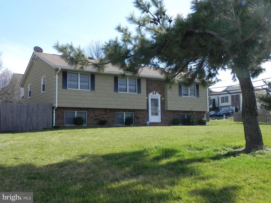 PRIDE OF OWNERSHIP  THIS SINGLE FAMILY SPILT LEVEL HOME SITS ON A LARGE CORNER LOT    4 BEDROOMS  2 FULL BATHS,  FRESHLY PAINTED THROUGH OUT , HARDWOOD FLOORS, EAT IN KITCHEN,  SEP. DINING ROOM , MASTER BEDROOM WITH MASTER BATH , 2 FIREPLACES FINISHED LOWER LEVEL  ONE YEAR HOME WARRANTY .  YOU WILL NOT BE DISAPPOINTED