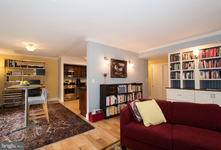 Are you looking to move into a completely rehabbed condo? Please come see this beautiful, largest 1 BR offered in Dunns Grove, with many upgrades:  quartz kitchen w/ SS, crown molding, and tile bath, fabulous custom-built library, all systems windows and doors, replaced. Beautiful new wood floors. Private landscaped patio for easy entertaining with possibility of  handicap access subject to condo