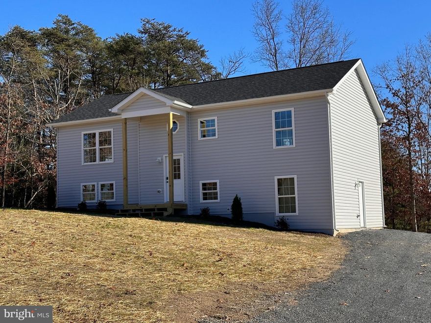 Nice new construction rental home.  Basement is not available, will be occupied at some point. Great location, right off 522 Valley Road.  Close to Cacapon State Park.  3 bedrooms, 2 full baths, new appliances, and laundry.  Very nice back deck and terrific views of Cacapon Mountain.