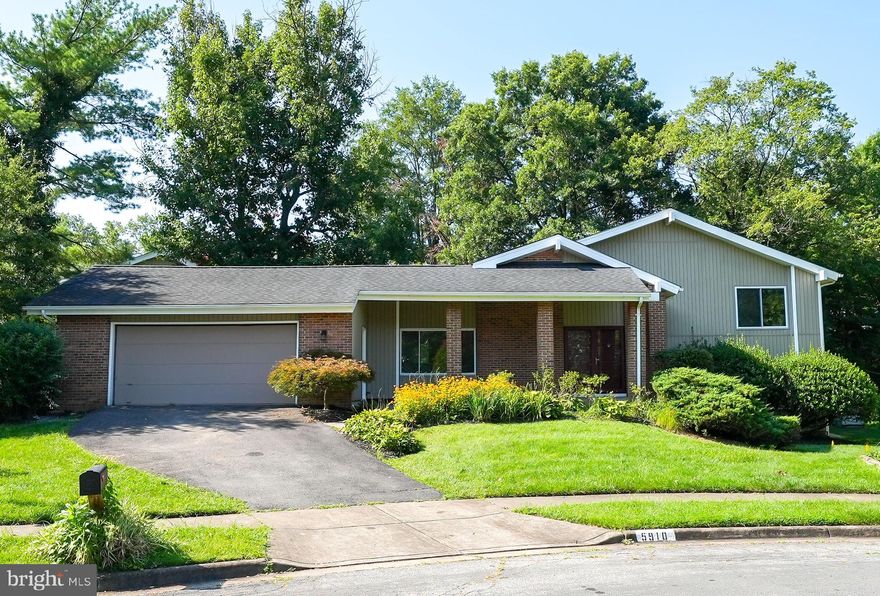 Major remodel 2023! 4 bedrooms/2 full baths on 3 levels. Freshly painted, new flooring throughout, LVP on main and lower, carpet on upper level. Bathrooms remodeled (new vanities/sinks, new tub in guest bath, new tile shower in primary, new tile floors in both)! Newer kitchen, Stainless Steel appliances -brand  new, never been used refrigerator and dishwasher - newer oven, white cabinets, white granite, tile backsplash, black and white tile floor, updated lighting fixtures, large island!  Welcome home to this beautiful and light filled Sam Simon 203A model in the lovely Southern Grove community just off Rolling Road in West Springfield. This move-in ready, completely remodeled, contemporary split level with a sunken living room provides plenty of space to spread out. Skylights, oversized windows and oversized sliding glass doors provide so much light!  Walk into the  foyer and be greeted by a dramatic central wood beam along the vaulted ceiling.  A sunken living room is complimented by a dining area and rounded out by the updated kitchen all on the main level. With the lower level providing a large recreation room with dry bar and oversized sliding glass doors leading to the rear yard, and a 4th bedroom with a separate entrance, along with storage and laundry rooms. Upstairs you'll find 3 well appointed bedrooms (all with new carpet) including the primary with a completely updated  en-suite bathroom.  There is a large attic accessed by the main stairway and an interior door providing easy access to your storage needs, or finish it off for your own bonus room! New Water Heater. The home is located on a cul-de-sac in a tucked-away neighborhood, yet conveniently located to schools (West Springfield tier), parks, shopping, dining and entertainment venues. Convenient to the Springfield/Franconia Metro station.