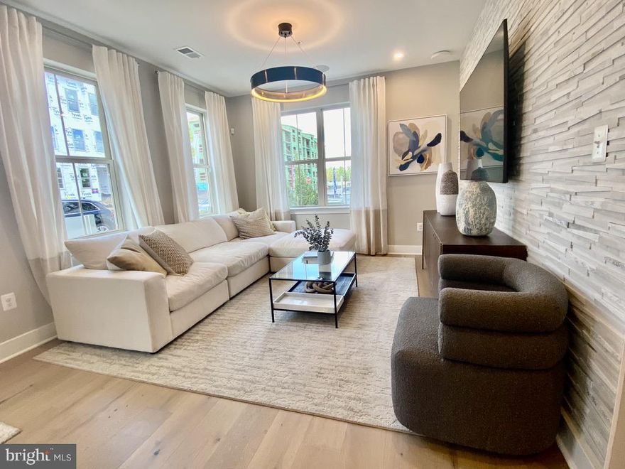 Don’t miss your chance to call this stunning, brand new 4-level townhouse with 2 car garage your home! Nestled in the highly sought-after "The Grove" community, this property is the only new development within the prestigious Wootton School District.

The WESTMORE floor plan boasts an impressive 2,500 sq. ft. of luxurious living space, featuring 4 spacious levels, including a private full suite on the loft level. With 4 bedrooms, 3 full baths and 2 half bath, there’s ample space for everyone. This particular unit, Lot #31D, offers a serene view facing the charming courtyard. 
Gourmet kitchen equipped with Bosch appliances, sleek Aristokraft white cabinets, and upgraded quartz countertops. Elegant wood floors throughout and a cozy gas fireplace for those chilly evenings
A  beautiful trek deck perfect for outdoor entertaining. Energy-efficient Rinnai tankless water heater and a rare large walk-in pantry. For your convenience, a model home is available for viewing to get a true feel for this exceptional property. Please note, a lockbox will be available after the settlement date of 11/04.
Ideal for tenants with a credit score of 700+ and a strong rental history. Preference for an 18-month lease or longer. Option to furnish the home for an additional monthly fee. Pets considered on a case-by-case basis (a $500 deposit required for approved pets, ideally under 25 lbs) Community Amenities: Upcoming community pool, clubhouse, soccer field, dog park, and scenic bike and walking trails. Plus, you’re just a short walk from Trader Joe's, the Travilah Shopping Center, and a variety of restaurants and shops at Traville Gateway. Lifetime Fitness, Shady Grove Adventist Hospital, and local universities are all within a quick 5-minute drive. Act fast—this incredible opportunity won’t last long! Explore more about The Grove online or reach out to me with any questions. Your dream home awaits! (photo were taken from model home. The actual home options may very)