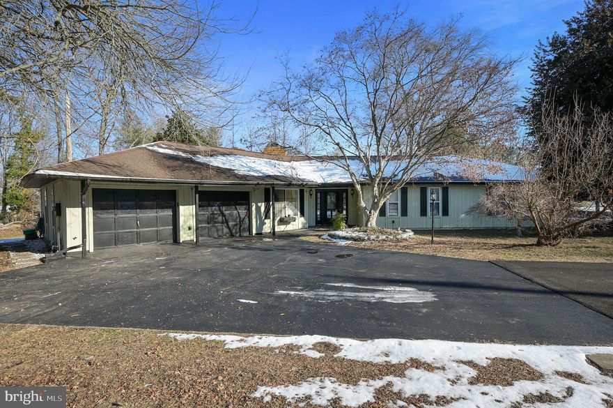 Welcome to 1393 Persimmon Tree Lane, a stunning 3-bedroom, 2-bath ranch home offering approximately 2,037 sq. ft. of living space. Located just outside Dover city limits (NO CITY TAXES), this charming property provides a peaceful retreat while remaining close to all conveniences.

As you enter, you'll notice the beautiful hardwood floors and spacious, vaulted beam ceiling that enhance the open flow between the living room, dining room, and kitchen. The double-sided brick fireplace creates a cozy atmosphere, perfect for relaxing or entertaining. The kitchen is a chef's dream, featuring quality cabinetry, granite countertops, and an abundance of cabinet and counter space.

Offering oversized bedrooms and a master bath has been completely renovated with a luxurious en-suite bath. A freestanding soaking tub, a large 6-ft tiled shower, a massive double vanity, and heated tile floors to keep yout toes warm in the winter - truly a spa-like experience.

This home is perfect for entertaining with its huge, wraparound enclosed 3-season porch that bathes in natural light, plus its own AC. Enjoy outdoor living with a two-tier deck and a screened-in gazebo. A large shed with electricity adds even more functionality to this property.

Additional recent update includes a newer HVAC system. Wood trim and solid wood 6-panel doors add a classic, warm touch throughout. Don’t miss out.