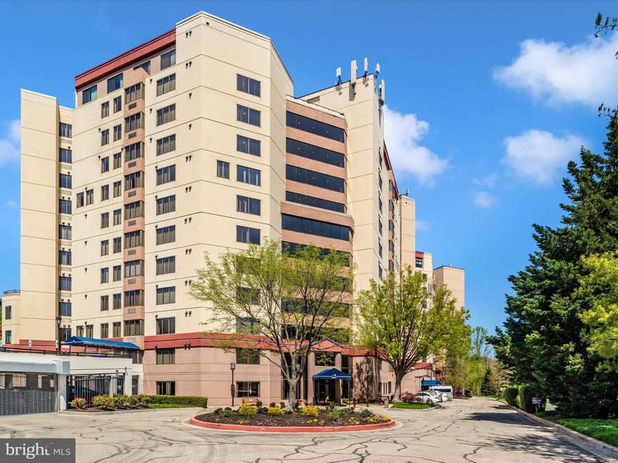 **Rarely Offered Luxury at The Watermark!**

Welcome to this exceptional 2-bedroom, 2-full bath condominium with den on the preferred 4th level of the highly sought-after Watermark building in Columbia's vibrant Wilde Lake Village. Adjacent to the dynamic Downtown Columbia, this expansive unit boasts nearly 1600 square feet of luxurious living space.

Enjoy breathtaking views of Wilde Lake from your private balcony and the spacious Primary Bedroom while looking out of newly replaced (2022) windows throughout this expansive unit and its open layout.
This coveted floorplan features two generously sized bedrooms, each complete with its own beautifully appointed and renovated en-suite full bathrooms, plus a large Den/Office/Guest Room offering flexible living options and space for all to enjoy.

Step inside and be impressed by the numerous updates and super tasteful upgrades throughout. Both bathrooms have been fully renovated with exquisite attention to detail, including stunning green marble floors in the primary bath and high-end finishes are on hand for both. The gorgeous kitchen is a chef's delight, showcasing rich wood cabinetry, sleek stainless-steel appliances, elegant quartz countertops, and a lovely glass and stone backsplash. The living area features beautiful and durable parquet-patterned ceramic flooring.

This bright and spacious unit offers ample storage with walk-in closet, a dedicated laundry and utility room for added convenience, and comes with the invaluable amenity of private assigned garage parking. As an added bonus, you'll also have access to three additional storage units within the building.

The Watermark condominium offers a gracious entry lobby with very helpful and friendly front desk staff, a well-appointed community room, a fully equipped fitness center, a sparkling in-ground private pool, and beautifully maintained landscaping. Situated adjacent to Wilde Lake Park, residents enjoy easy access to nature and all the exceptional amenities that Columbia has to offer. Don't miss this rare opportunity to experience upscale living in a prime location!