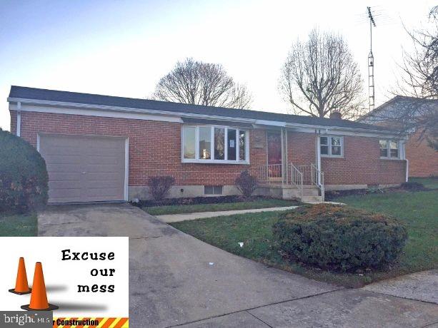 Rock solid brick rancher 1 block from schools. New kitchen, new appliances, gorgeous hardwood floors, remodeled bath, large back yard w/covered patio, and all new paint. 1 Year home warranty & free home inspection!!
