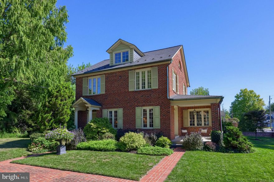 Old-world elegance and modern comfort come together in this exceptional home, ideally located just moments from Downtown Manheim. Enjoy easy access to Market Square, historic architecture, and a vibrant mix of locally owned boutiques, cafés, and shops.

Offering four bedrooms, three full baths, and a powder room, this residence delivers space, character, and standout features at every turn. A stately brick exterior welcomes you inside to a foyer with brick tile flooring, setting the tone for the craftsmanship throughout. The main level offers a comfortable living room, formal dining room, and a sunroom filled with natural light, perfect for quiet mornings or afternoon relaxation. A convenient powder room and laundry area with utility sink add everyday practicality.

The eat-in kitchen is designed to impress, featuring hardwood floors, granite countertops, a GE Profile five-burner cooktop, Broan hood vent, Bosch double ovens, Sub-Zero refrigerator, Fisher & Paykel two-drawer dishwasher, pendant lighting, multiple lazy Susans, and a pantry with pull-out drawers. The adjoining breakfast area flows seamlessly into the inviting family room with a wood-burning fireplace, an ideal setting for cozy evenings.

The expansive great room is truly a showpiece. Designed for entertaining and recreation, it features a game area with pool table, kitchenette with electric two-burner cooktop, skylights that fill the space with natural light, and a full bath with double sinks and stall shower. The Kohler Habitat Environmental Enclosure indoor spa system, complete with sun, steam, and rain features—creates a unique retreat right at home. Elevator access provides a convenient connection from the great room to the primary suite above.

Upstairs, a balcony overlooks the great room below. French doors lead to the spacious primary bedroom with vaulted ceiling and fireplace. The primary bath offers generous storage, walk-in and additional closet space, stall shower, water closet with bidet, and abundant cabinetry. Just outside the suite, a loft provides flexible space for an office, studio, or additional lounge area. Three additional bedrooms and a full bath complete the upper level, including one bedroom with its own loft and access to unfinished attic storage.

The lower level includes a recreation room plus unfinished storage space.

Step outside to a level, fenced backyard featuring a patio, storage shed, and open lawn area, ideal for outdoor enjoyment and gatherings.

This home offers distinctive spaces, architectural character, and exceptional amenities. Schedule your private tour and experience it in person.