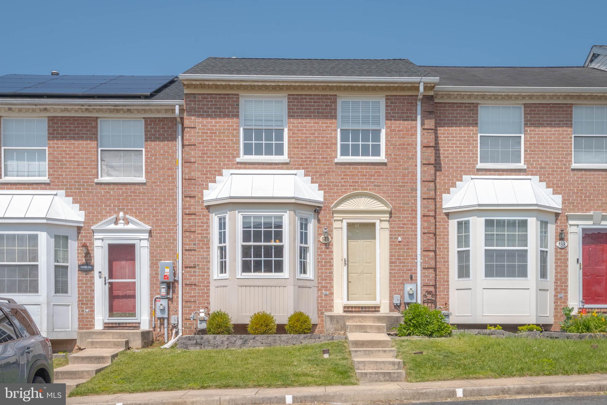 Welcome to 540 Doefield Ct, a 3-bedroom, 2.5-bath townhome in the highly desirable neighborhood of Constant Friendship. This move-in ready home combines comfort, style, and convenience—perfect for modern living. Step into a warm and inviting living room adorned with gleaming hardwood floors that flow seamlessly into a bright, open kitchen. The kitchen features elegant quartz countertops, a stylish tile backsplash, and direct access to a spacious elevated deck—ideal for entertaining or simply relaxing while enjoying serene views of the fenced backyard. Upstairs, you'll find three generously sized bedrooms with soaring cathedral ceilings and a well-appointed full bathroom. The finished walk-out basement offers valuable additional living space, complete with a full bathroom—perfect for a home office, recreation room, or guest suite. Enjoy outdoor living with a private fenced-in yard, patio, and a handy storage shed. Newer roof was replaced in 2019. The neighborhood is thoughtfully designed with sidewalks, two playgrounds, and is just minutes from shopping, dining, and major routes including I-95 for an easy commute. All this plus a one-year home warranty covering most systems! Don’t miss your chance to own this beautiful home in a fantastic location—schedule your private tour today!